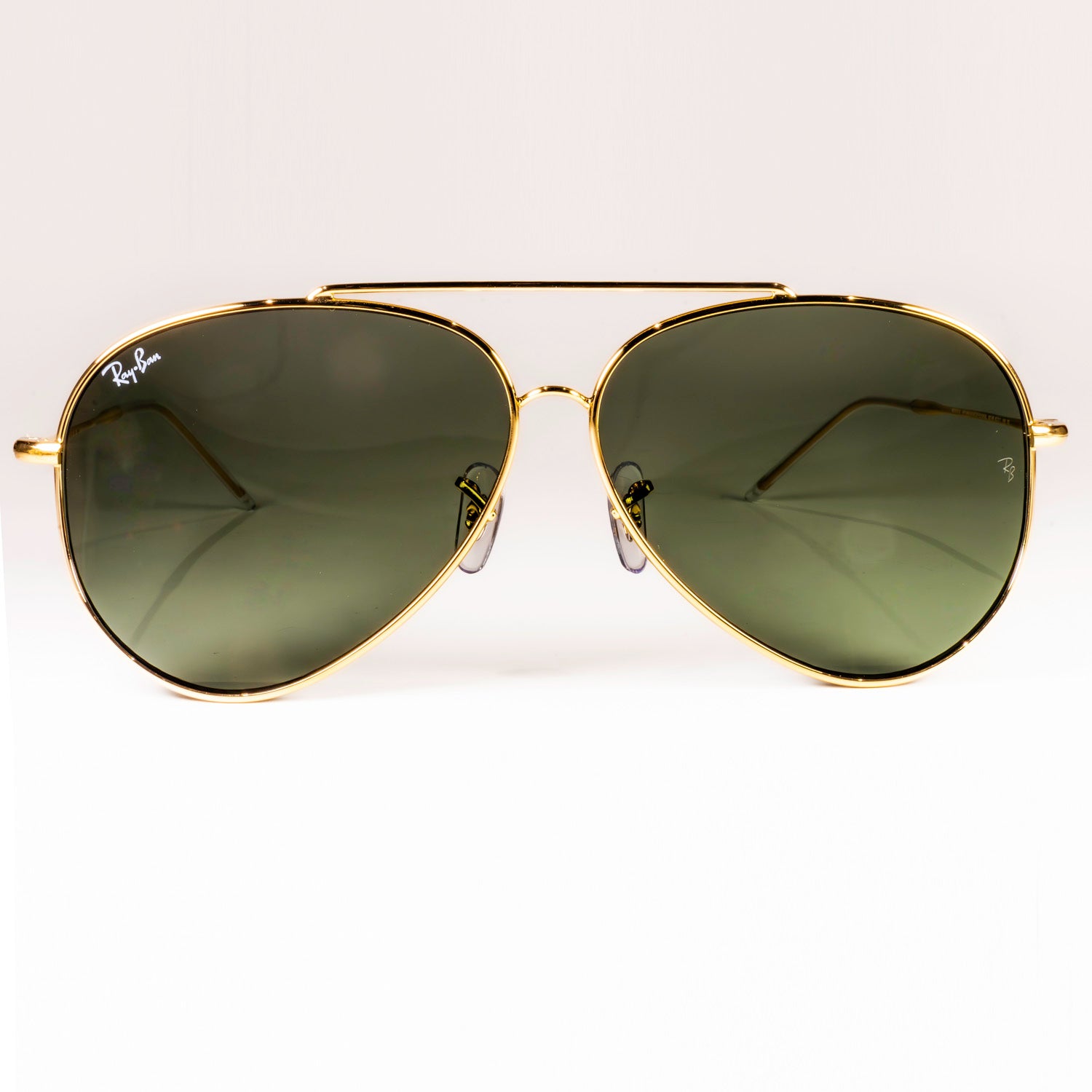 Ray-Ban RBR0101S Aviator Reverse sunglasses featuring a classic pilot shape with a sleek metal frame.