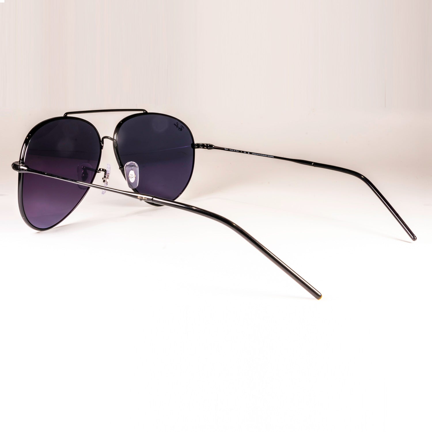 Ray-Ban RBR0101S Aviator Reverse sunglasses featuring a classic pilot shape with a sleek metal frame.