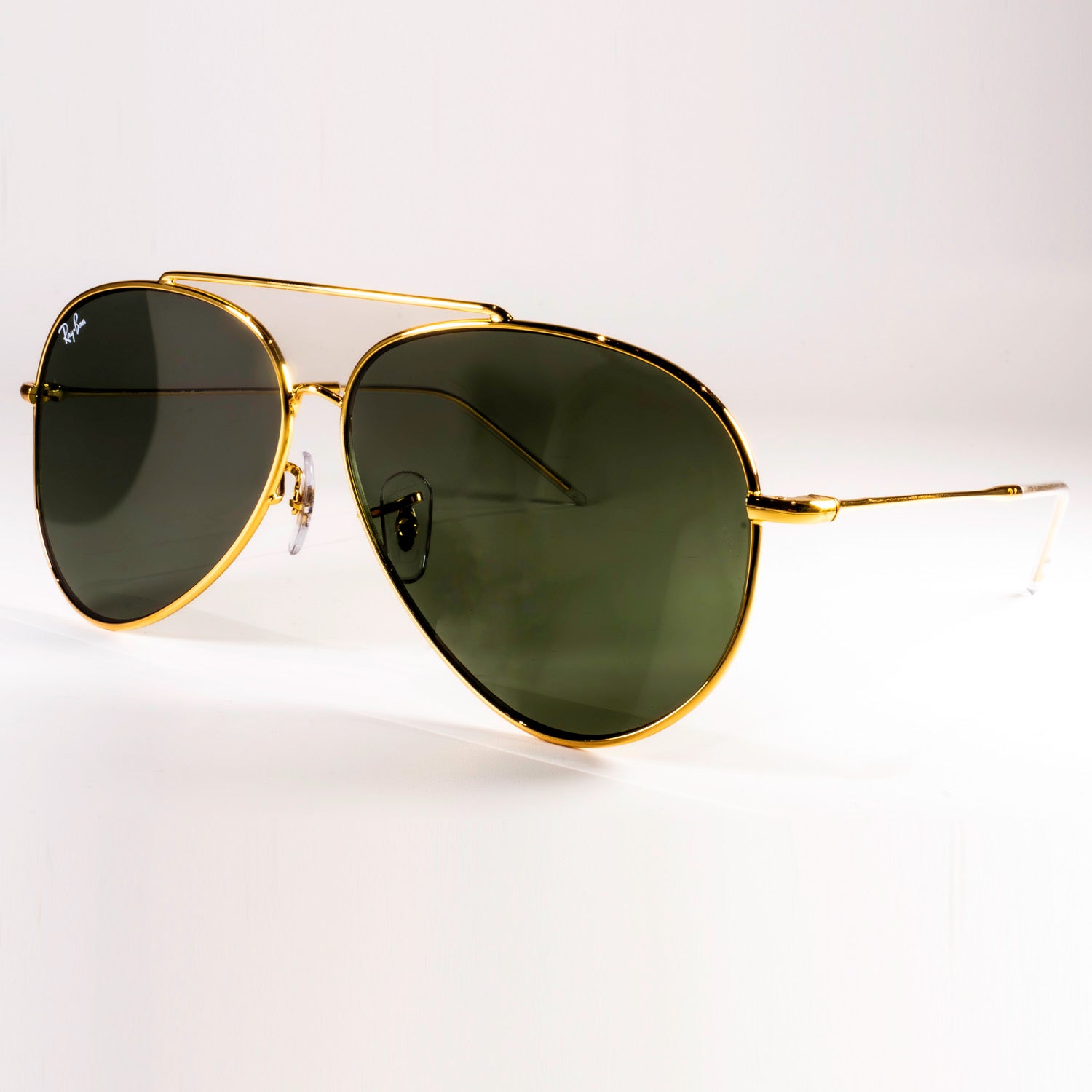 Ray-Ban RBR0101S Aviator Reverse sunglasses featuring a classic pilot shape with a sleek metal frame.