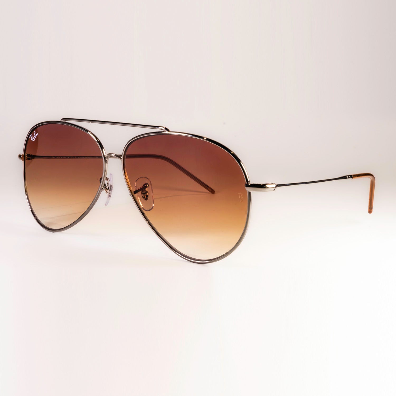 Ray-Ban RBR0101S Aviator Reverse sunglasses featuring a classic pilot shape with a sleek metal frame.