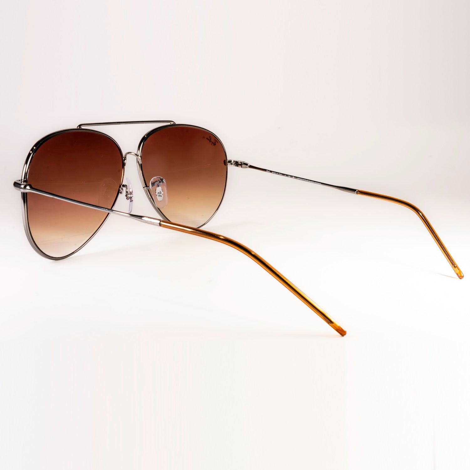 Ray-Ban RBR0101S Aviator Reverse sunglasses featuring a classic pilot shape with a sleek metal frame.