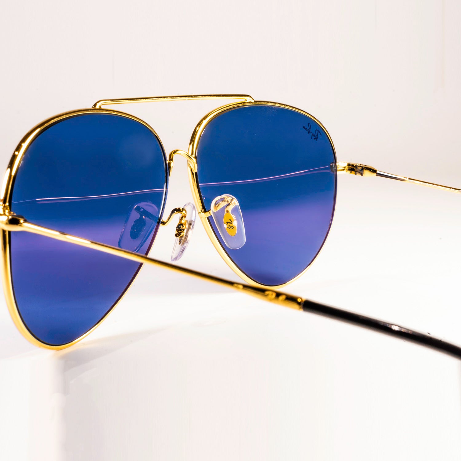 Ray-Ban RBR0101S Aviator Reverse sunglasses featuring a classic pilot shape with a sleek metal frame.