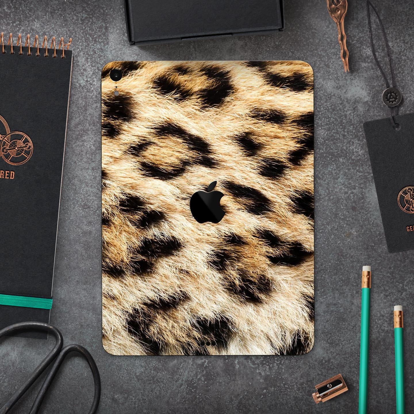 Real Cheetah Animal Print skin decal for Apple iPad, showcasing a vibrant cheetah pattern on a sleek surface.