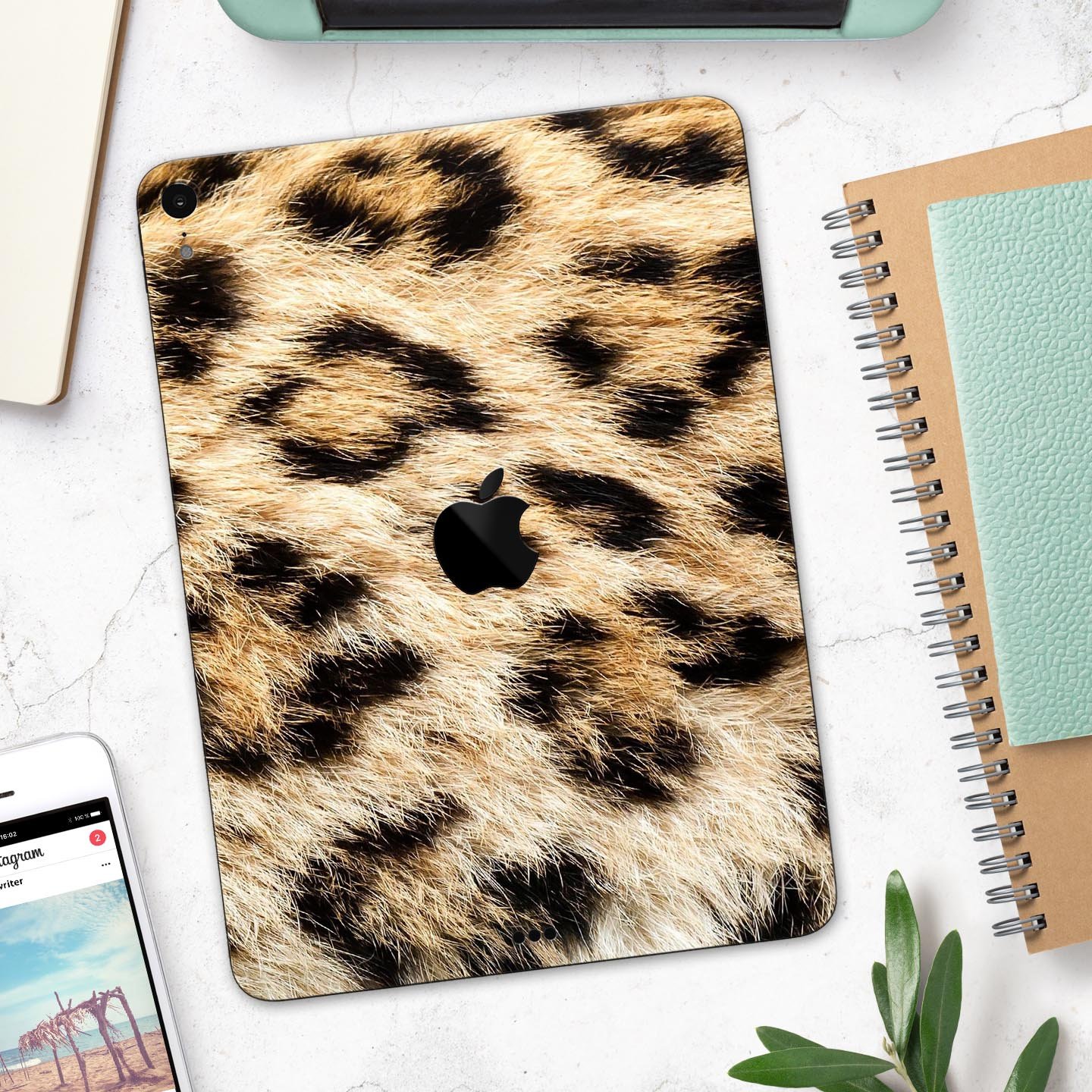 Real Cheetah Animal Print skin decal for Apple iPad, showcasing a vibrant cheetah pattern on a sleek surface.