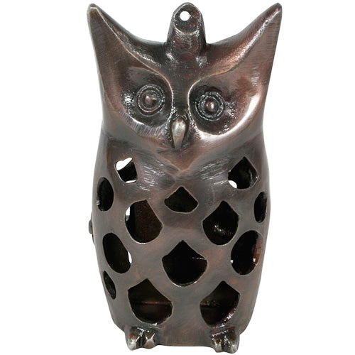 A charming recycled metal owl luminary, handmade with intricate details, perfect for outdoor lighting.