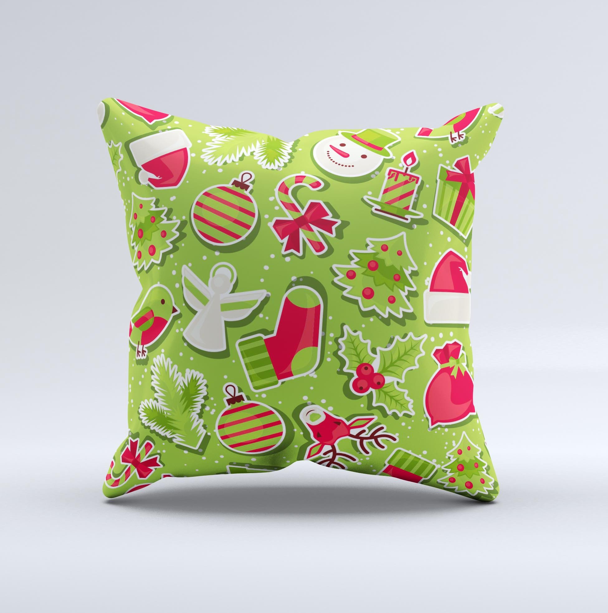 A vibrant red and green decorative throw pillow featuring Christmas icons, handcrafted in Virginia with a unique ink-fuzed design.