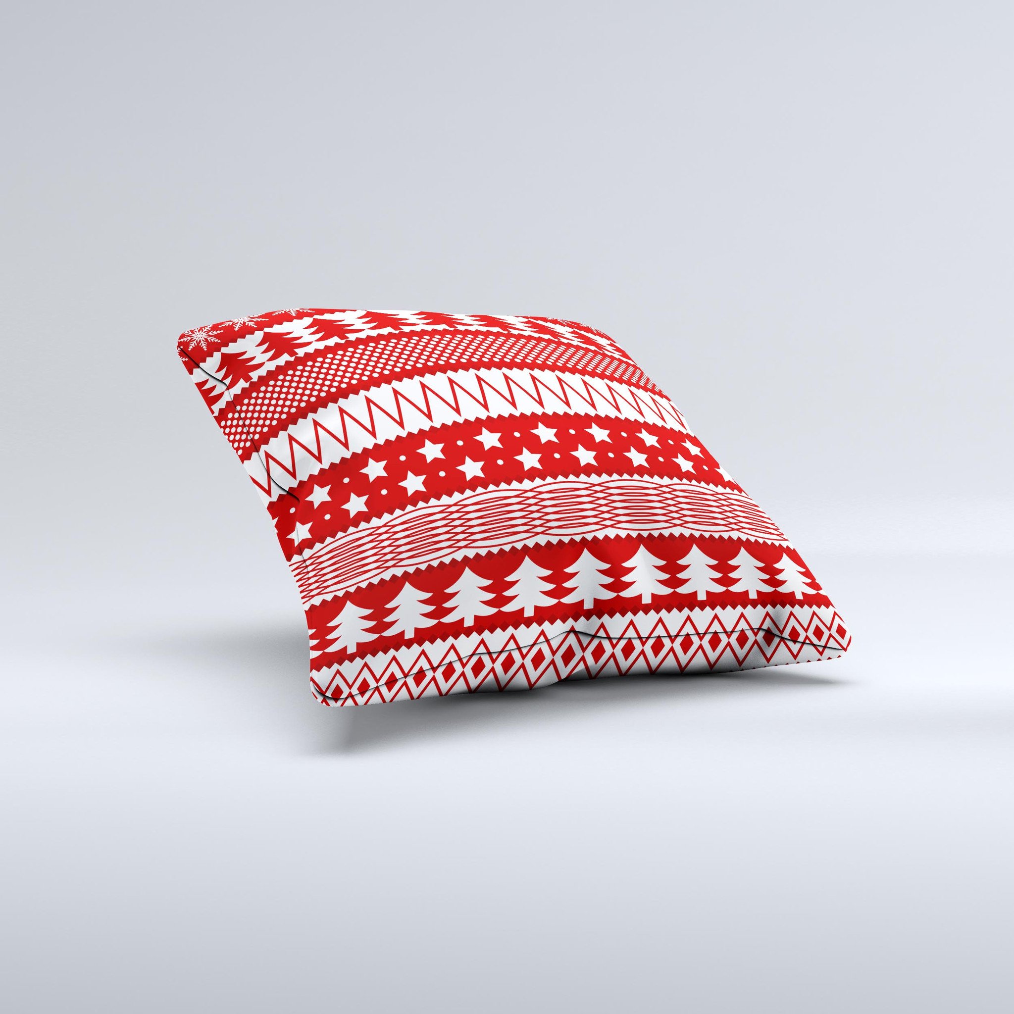 Red and white decorative throw pillow featuring a Christmas pattern, handcrafted in Virginia with high-quality materials.