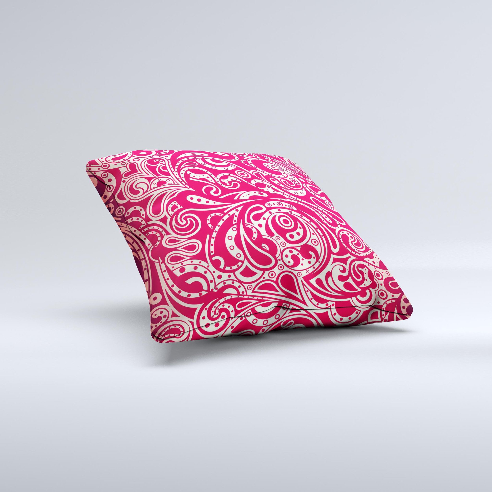 Red floral paisley pattern decorative throw pillow, showcasing intricate designs and vibrant colors, perfect for home decor.