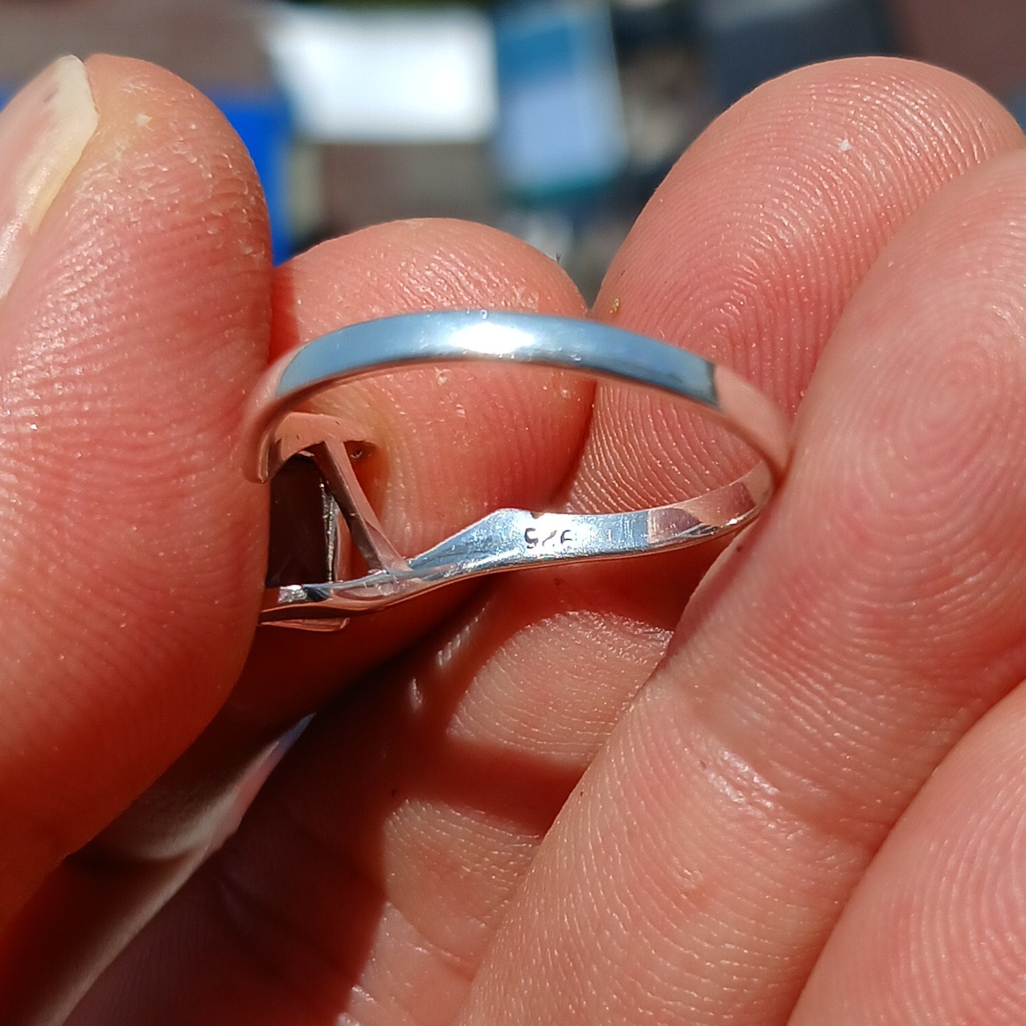 Elegant Red Garnet Ring in sterling silver with a rectangle-shaped cabochon, showcasing a polished band and minimalist design.