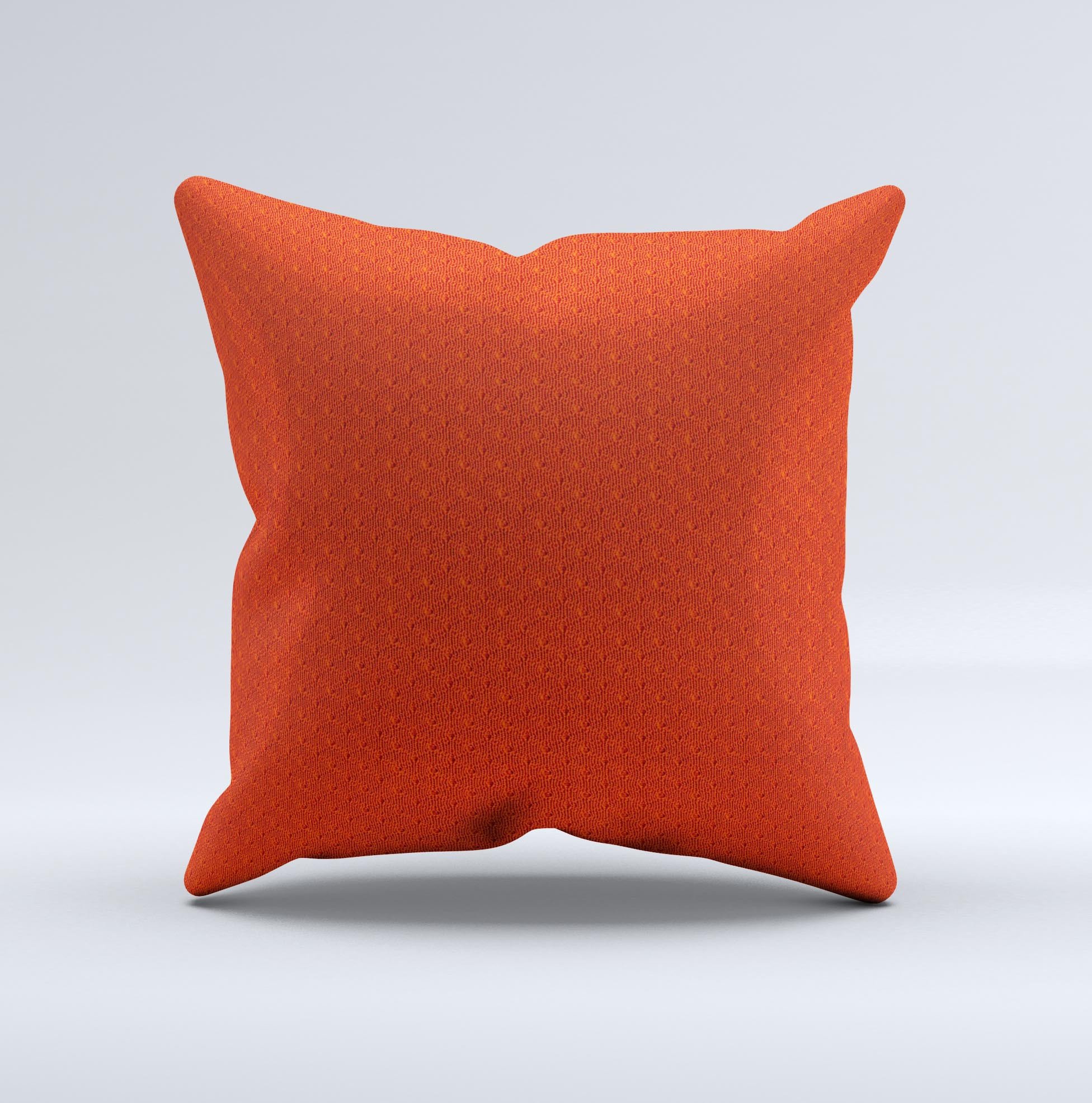 A vibrant red decorative throw pillow with a textured jersey design, handcrafted in Virginia, showcasing unique imperfections.