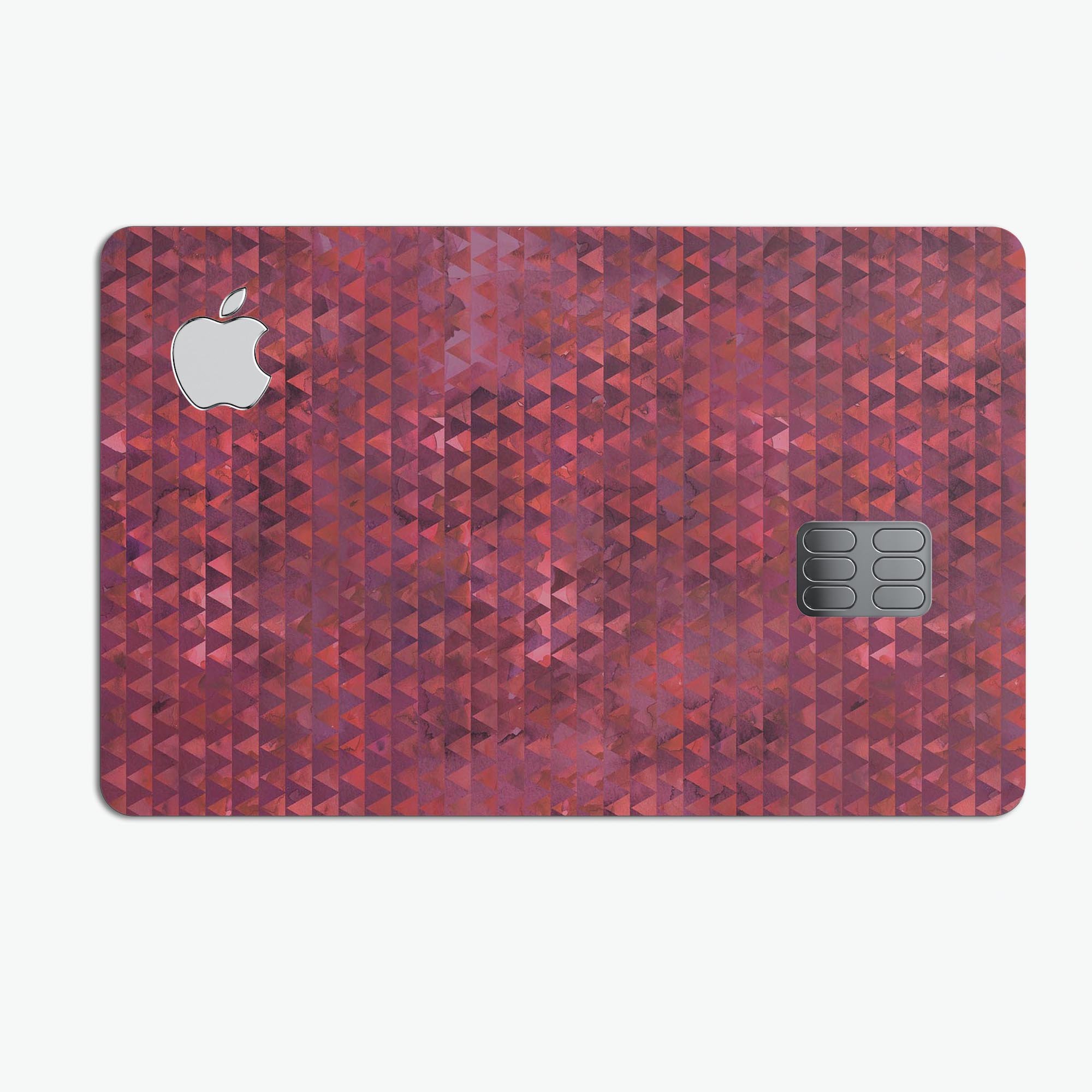 Red textured triangle pattern decal skin for Apple Card, showcasing premium vinyl material and stylish design.