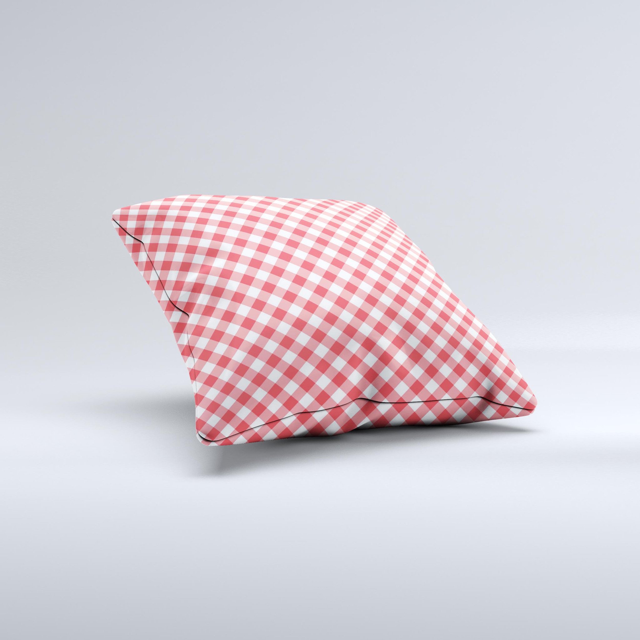 Red and white plaid decorative throw pillow with ink-fuzed design, showcasing a unique handcrafted appearance.