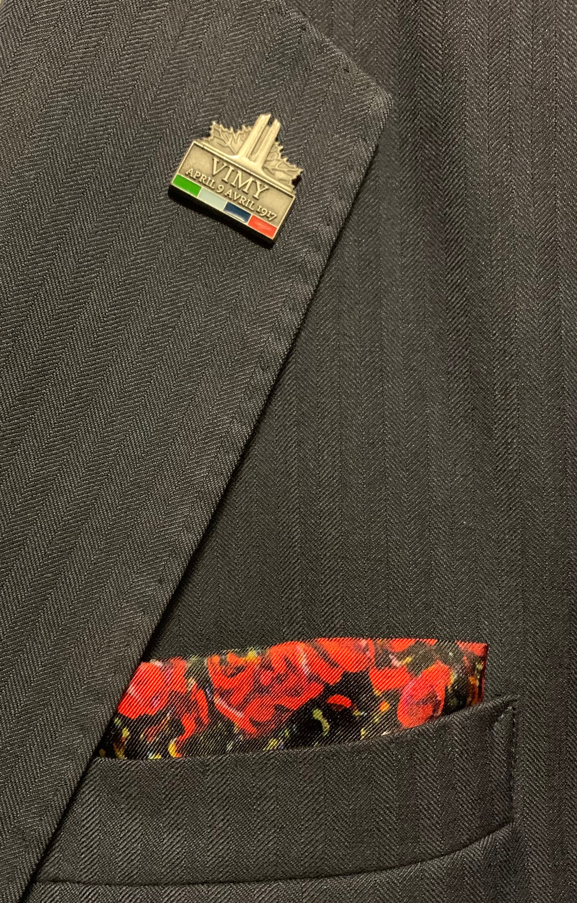 A luxurious Remember The Fallen Pocket Square made of 100% silk, featuring a design that honors the sacrifices of Armed Forces members.