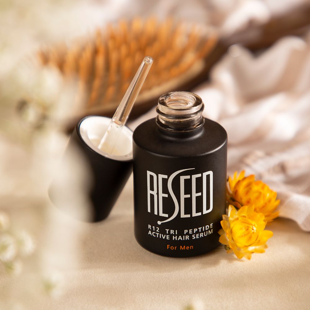 RESEED R12 Tri Peptide Active Hair Serum for Men in a 30ml bottle, showcasing its sleek design and label.