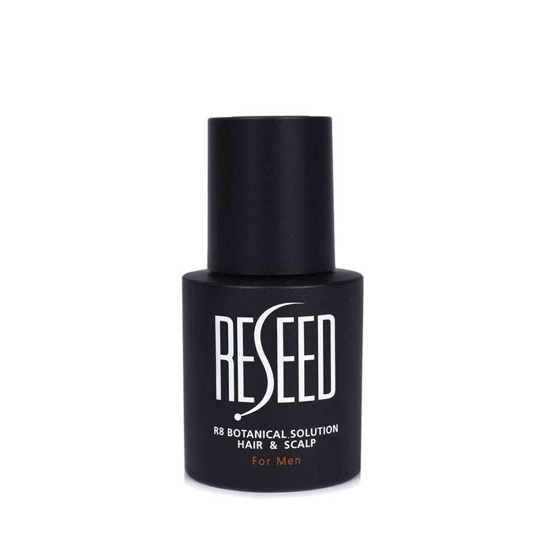 Bottle of RESEED R8 Botanical Hair Solution for Men, featuring a sleek design with a dropper for easy application.