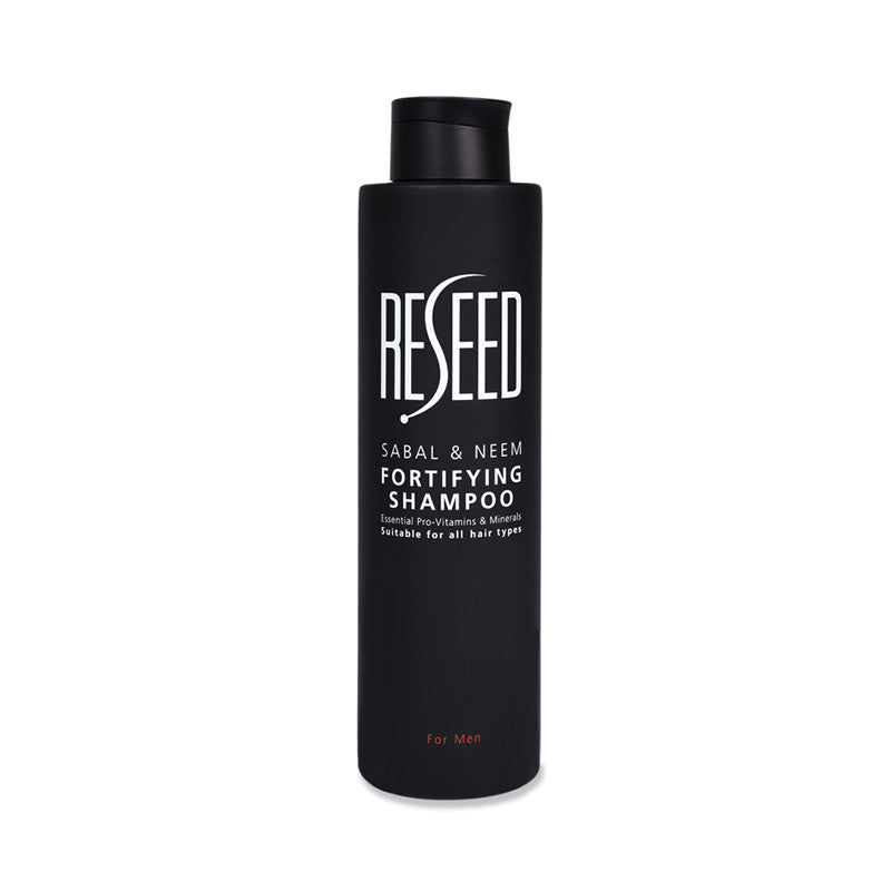 RESEED Sabal and Neem Fortifying Shampoo for Men in a 250ml bottle, showcasing its natural ingredients and sleek design.