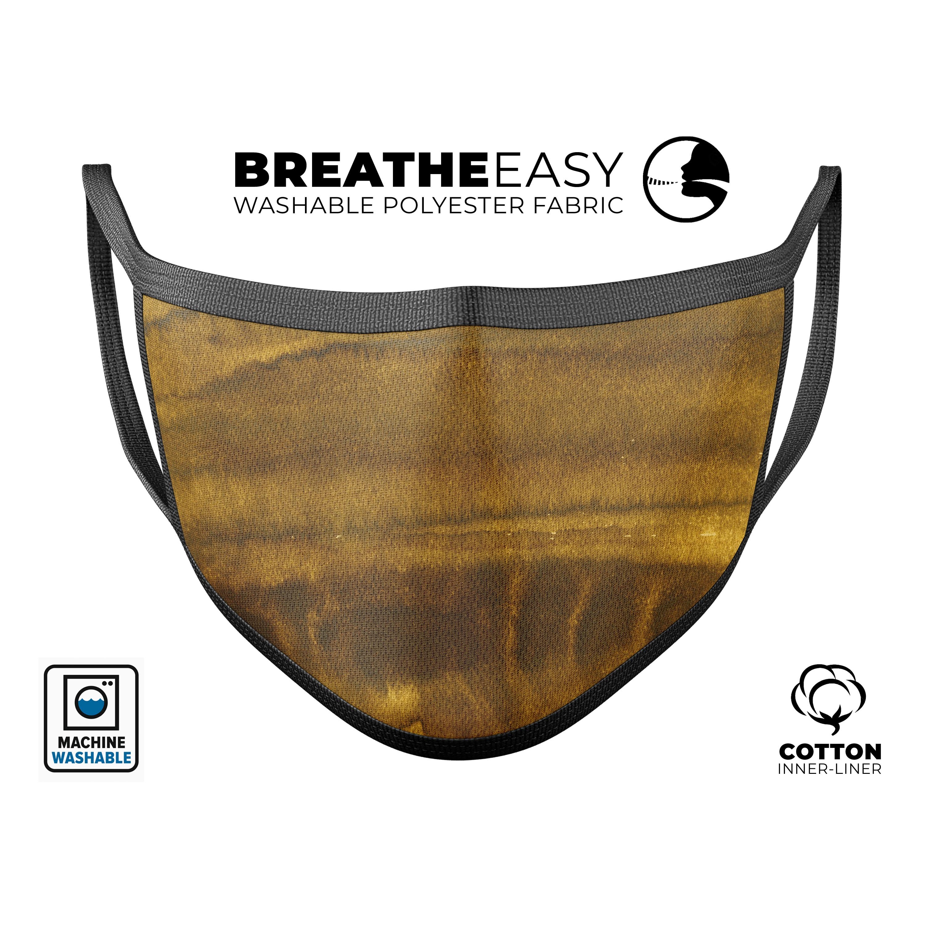 Resting Golden Sediment Mouth Cover, a stylish unisex anti-dust face mask made in the USA, featuring adjustable ear-loops and a comfortable cotton interior.