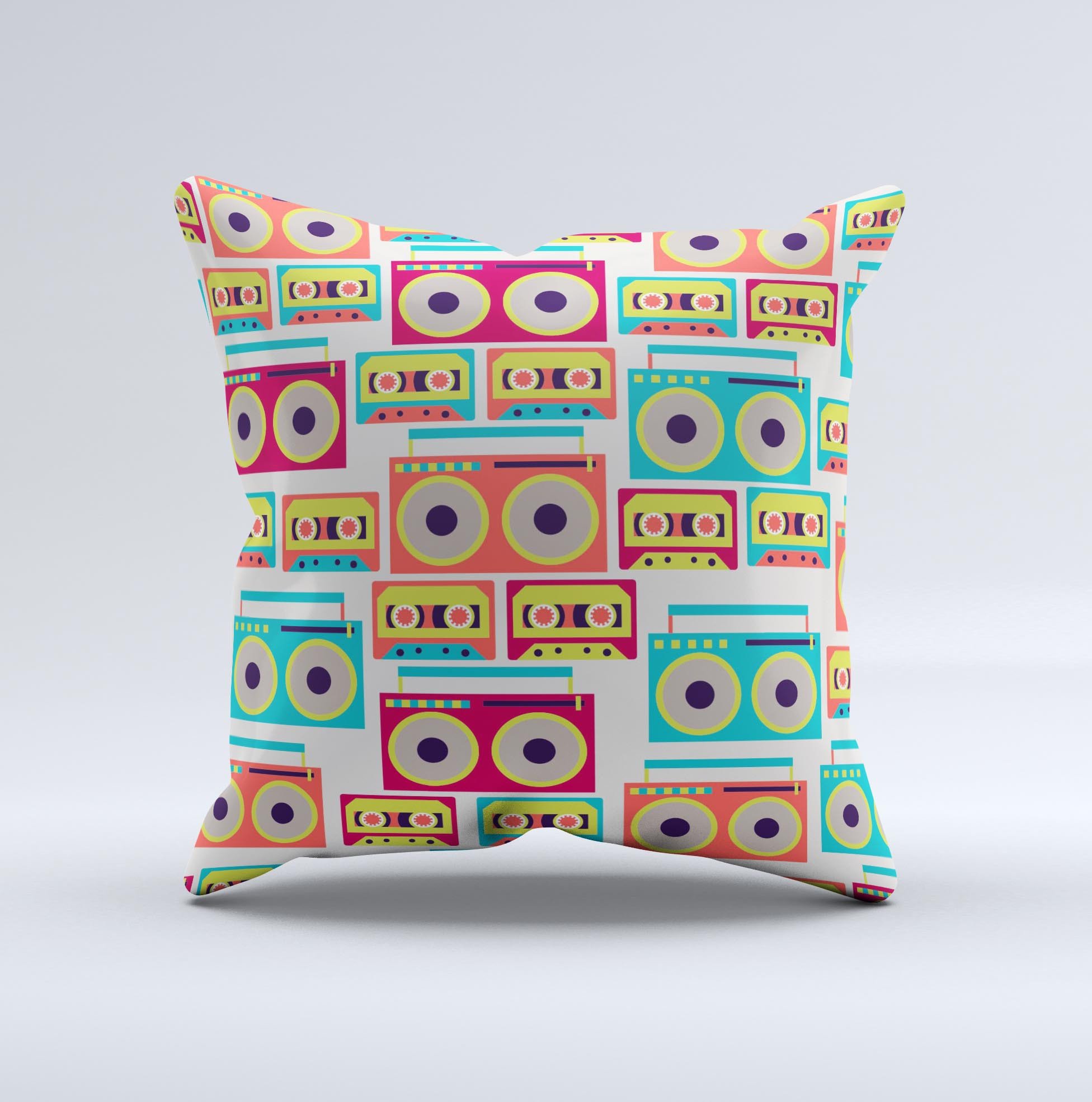 A decorative throw pillow featuring a vibrant retro boombox pattern, handcrafted in Virginia with high-quality fabric and polyester filling.