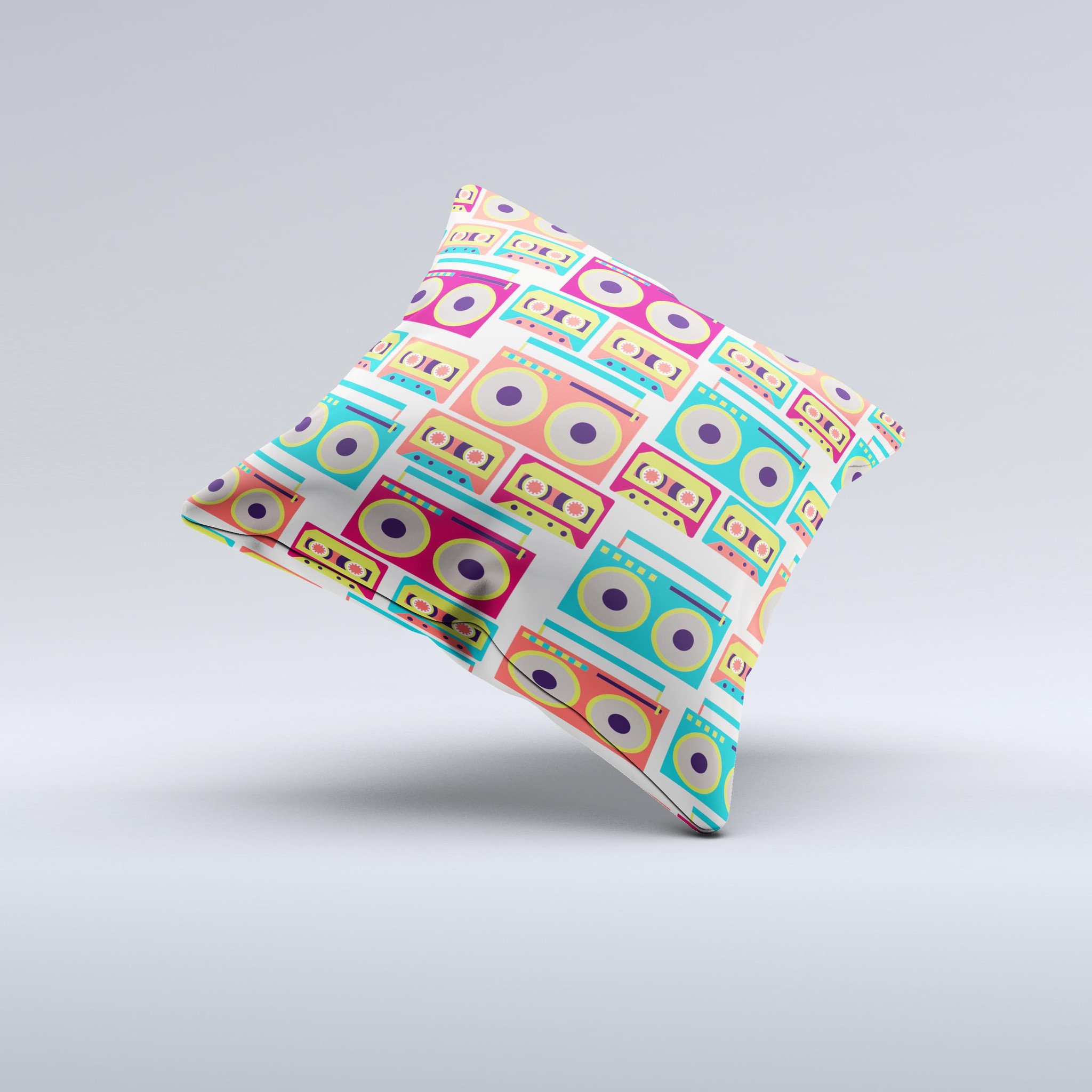 A decorative throw pillow featuring a vibrant retro boombox pattern, handcrafted in Virginia with high-quality fabric and polyester filling.