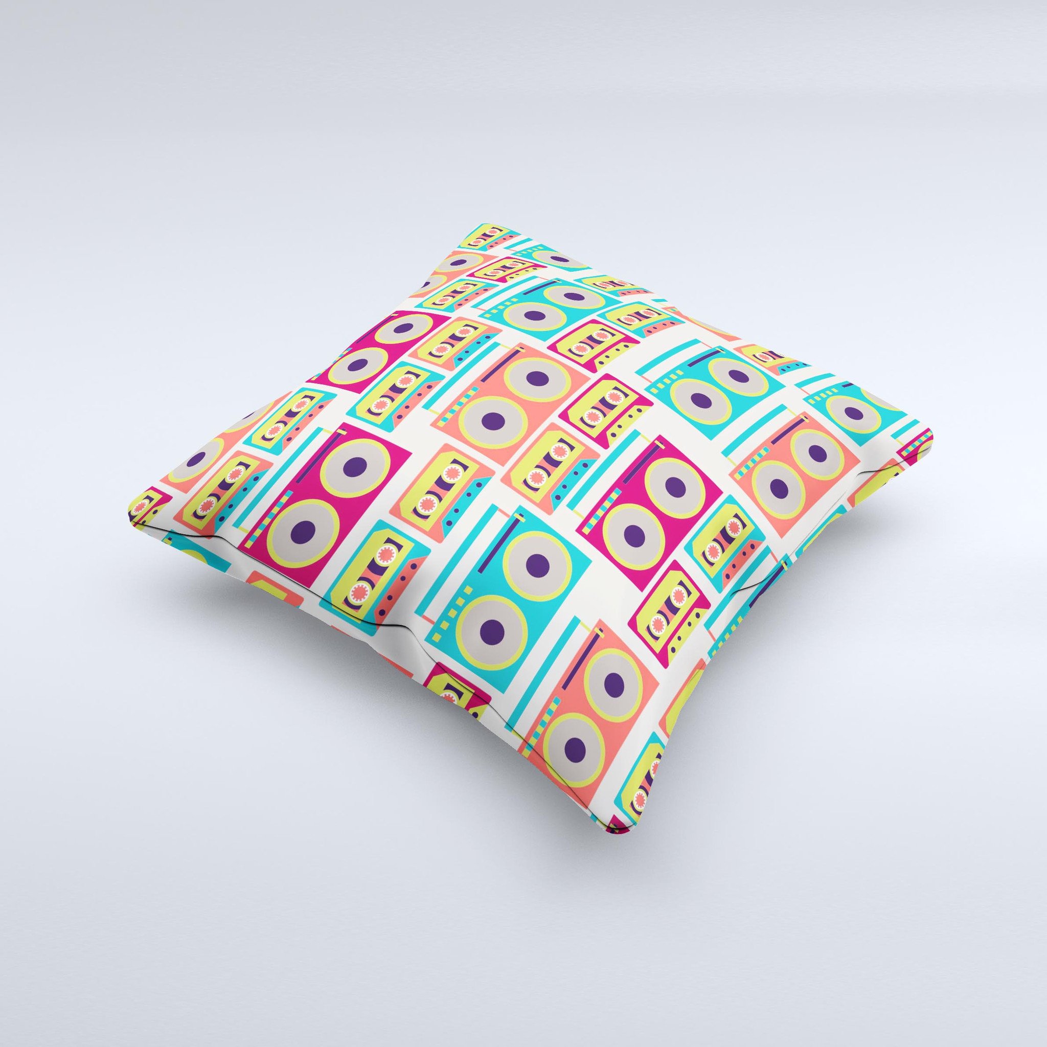 A decorative throw pillow featuring a vibrant retro boombox pattern, handcrafted in Virginia with high-quality fabric and polyester filling.