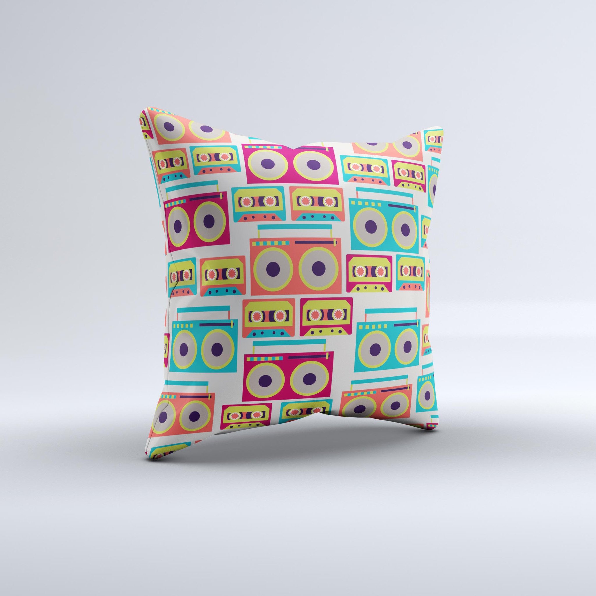 A decorative throw pillow featuring a vibrant retro boombox pattern, handcrafted in Virginia with high-quality fabric and polyester filling.