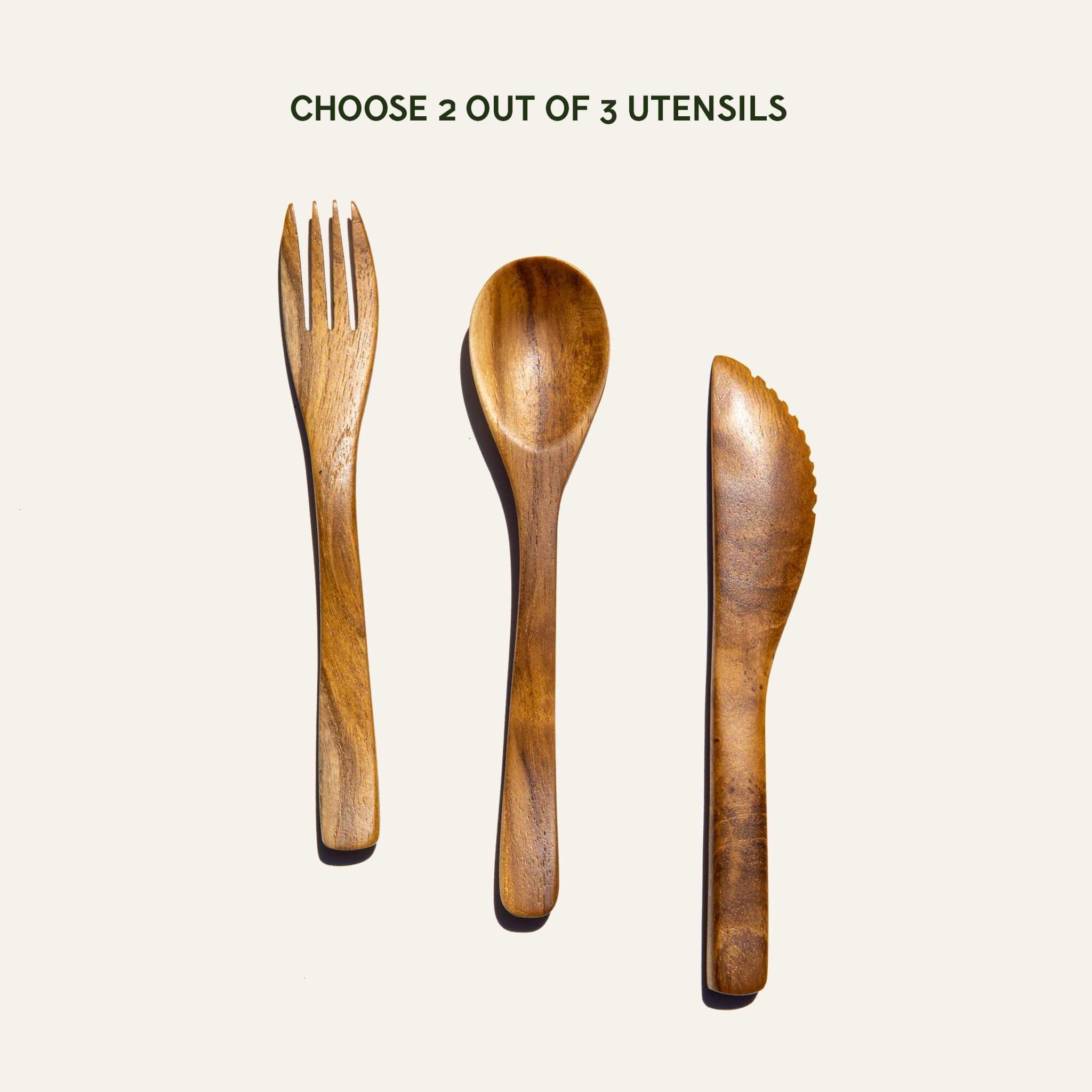 Compact Duebest™ reusable wooden cutlery set featuring hand-carved teak utensils and a fabric case with a metal carabiner.