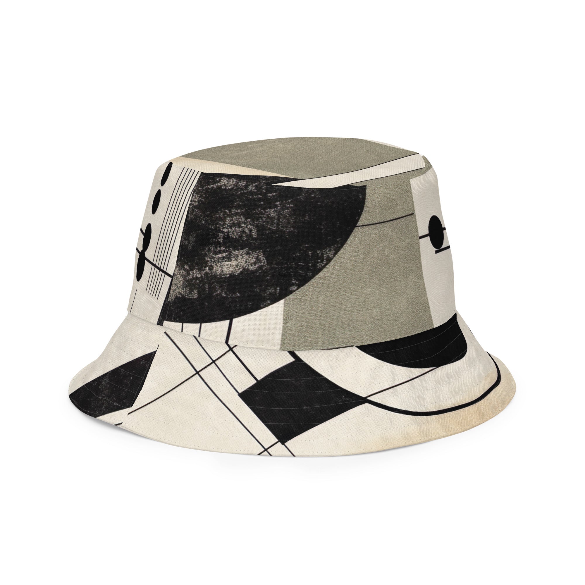 Reversible bucket hat featuring abstract geometric shapes in black, beige, and brown, showcasing both sides of the design.