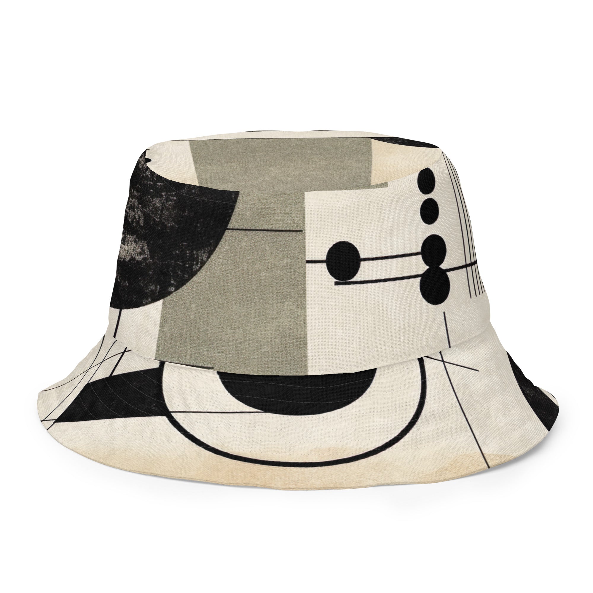 Reversible bucket hat featuring abstract geometric shapes in black, beige, and brown, showcasing both sides of the design.