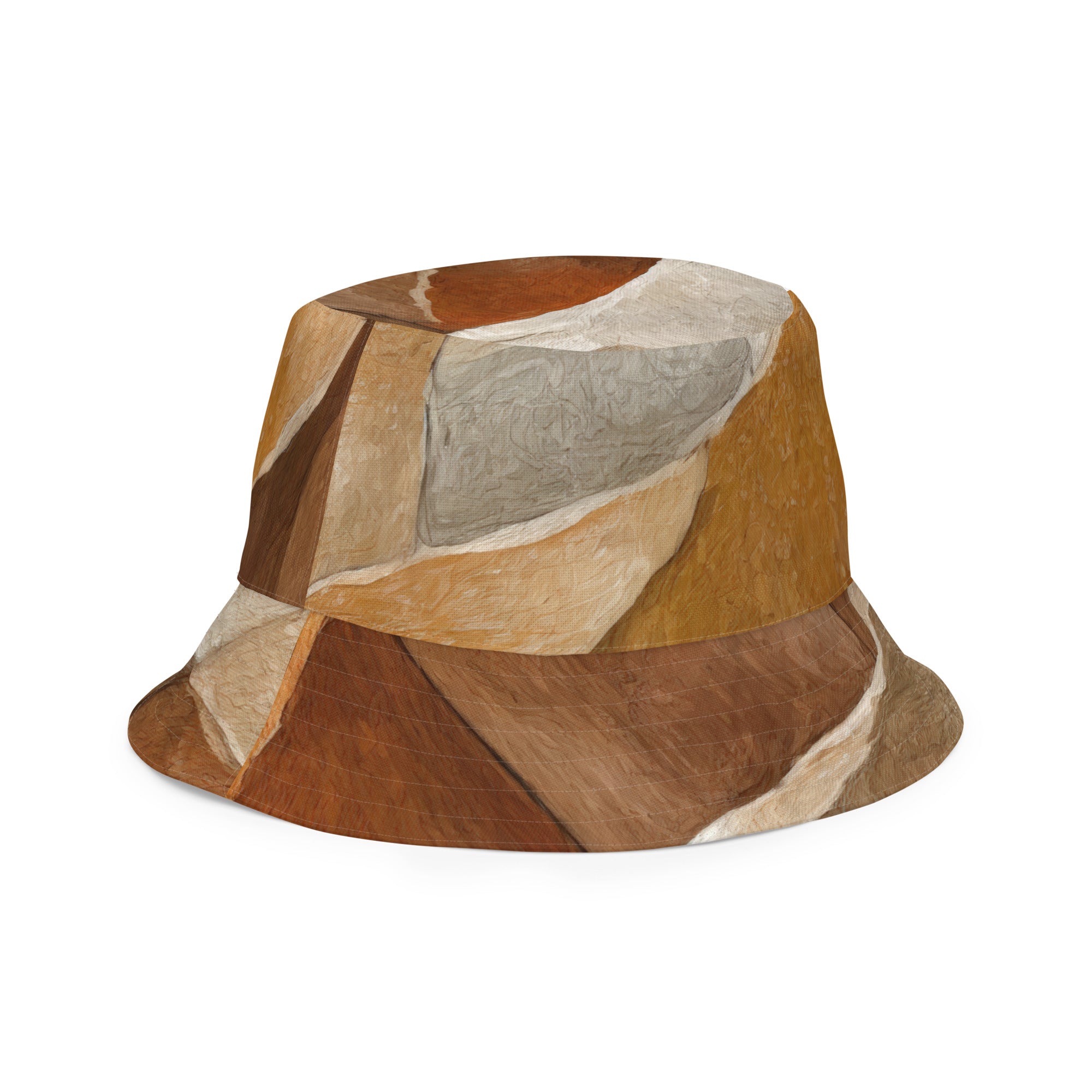 Reversible bucket hat featuring an abstract stone pattern, showcasing its stylish design and wide brim for sun protection.