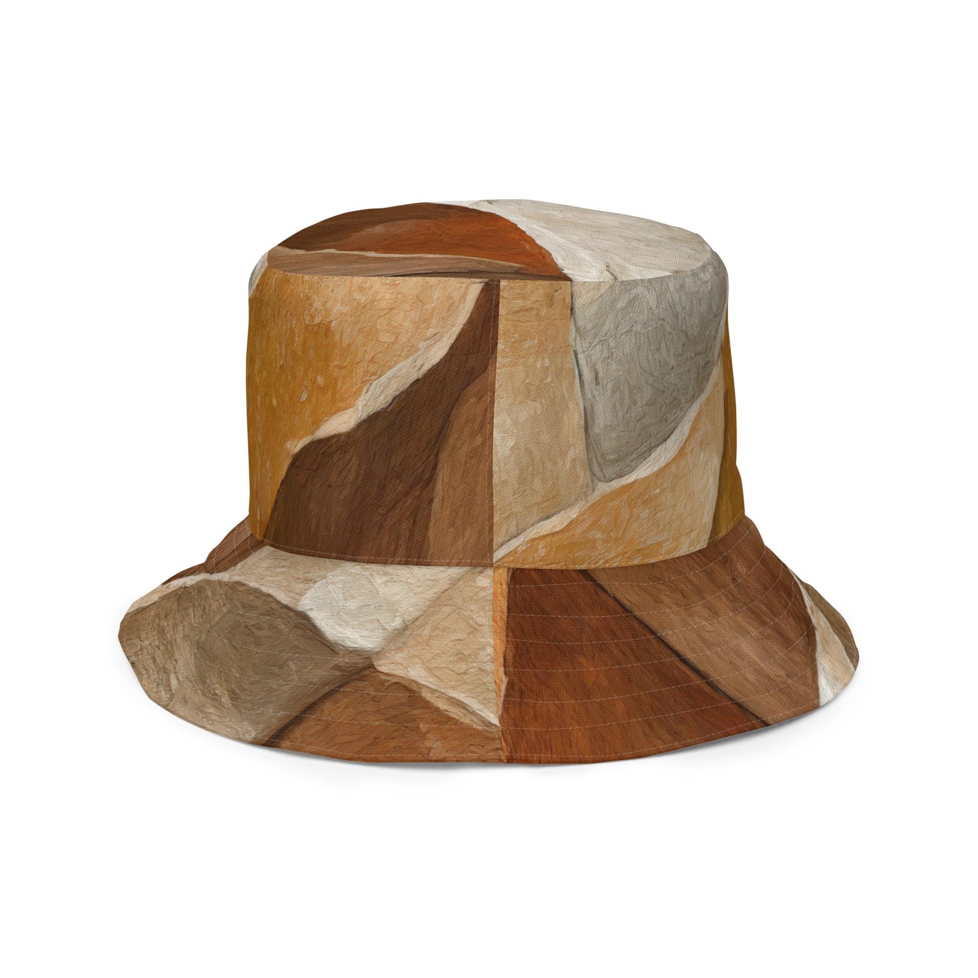 Reversible bucket hat featuring an abstract stone pattern, showcasing its stylish design and wide brim for sun protection.