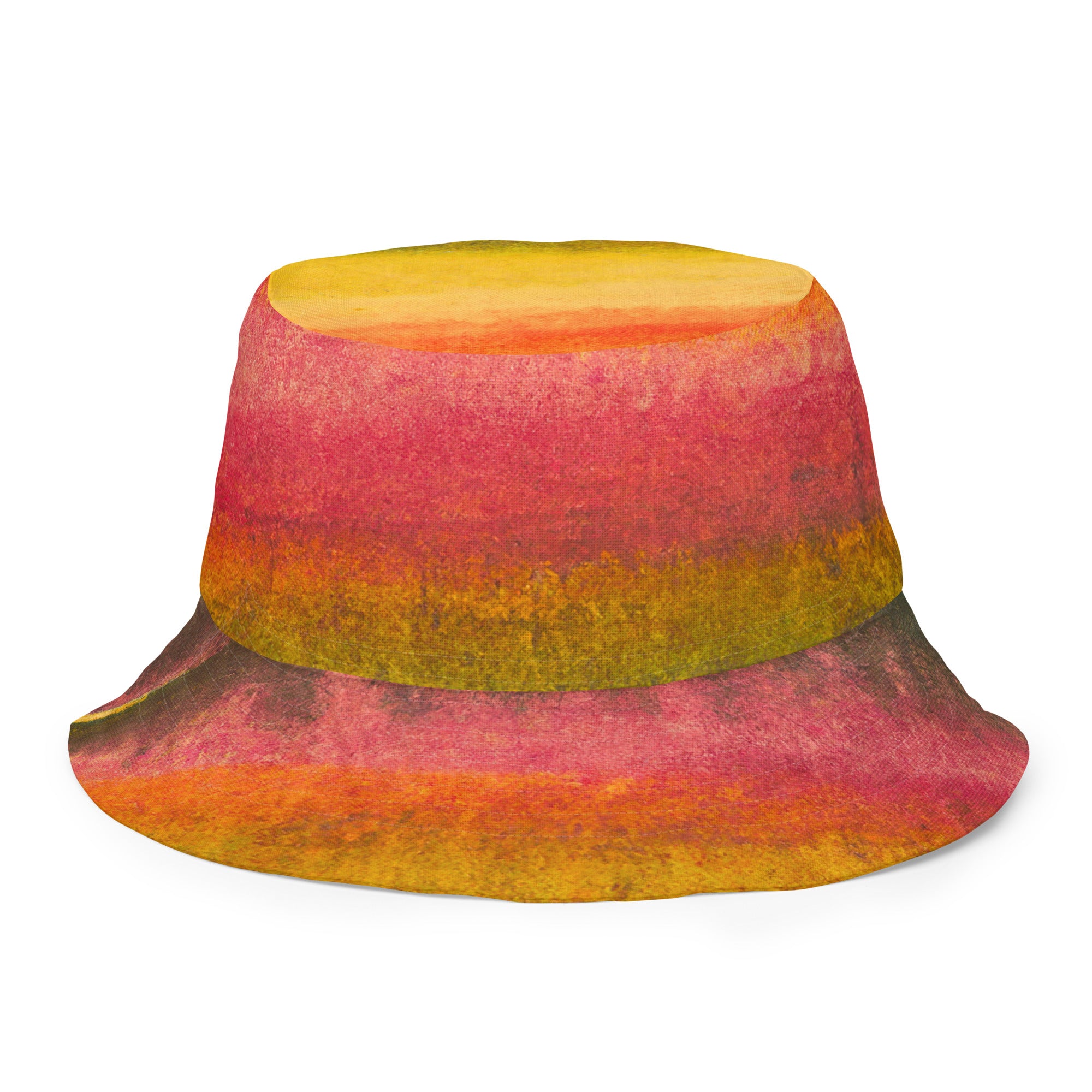 Reversible bucket hat featuring a watercolor abstract print, perfect for autumn and fall fashion, made from breathable polyester fabric.