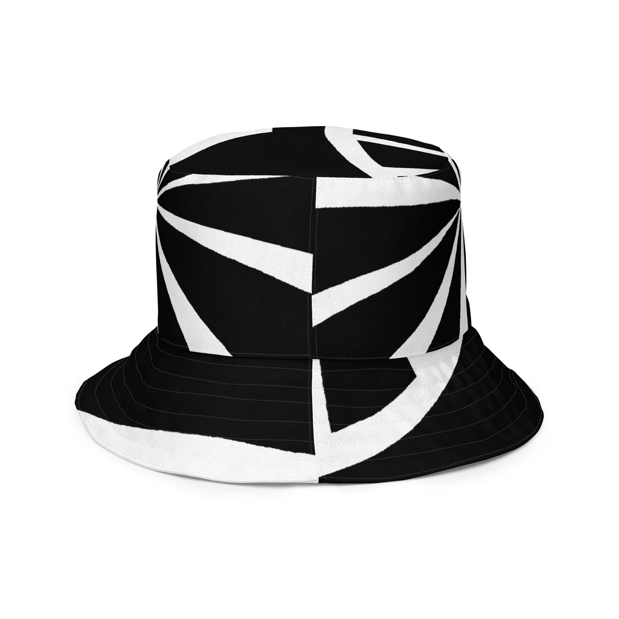 Reversible bucket hat featuring a black and white geometric pattern, showcasing its stylish design and premium fabric.