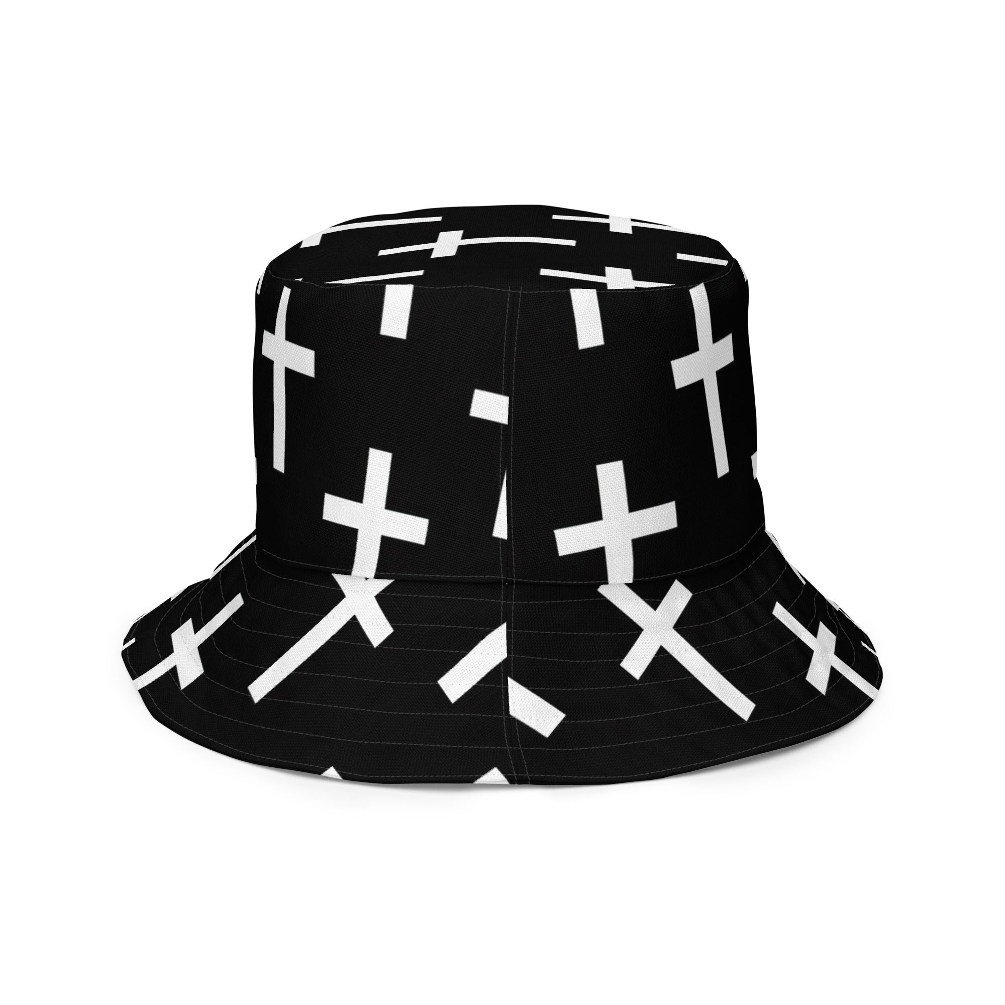 Reversible bucket hat featuring a black and white seamless cross print, showcasing its stylish design and premium fabric.