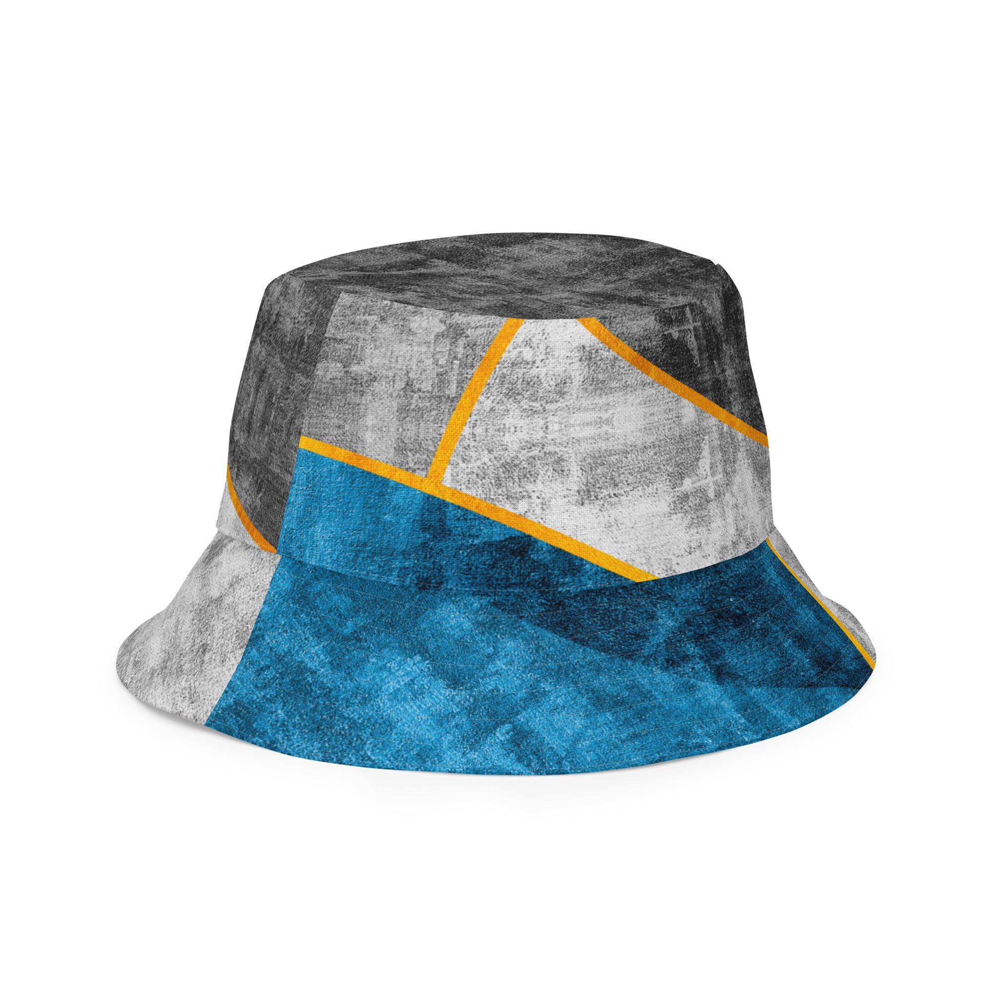 Reversible bucket hat featuring a blue grey geometric pattern, showcasing both sides of the design.