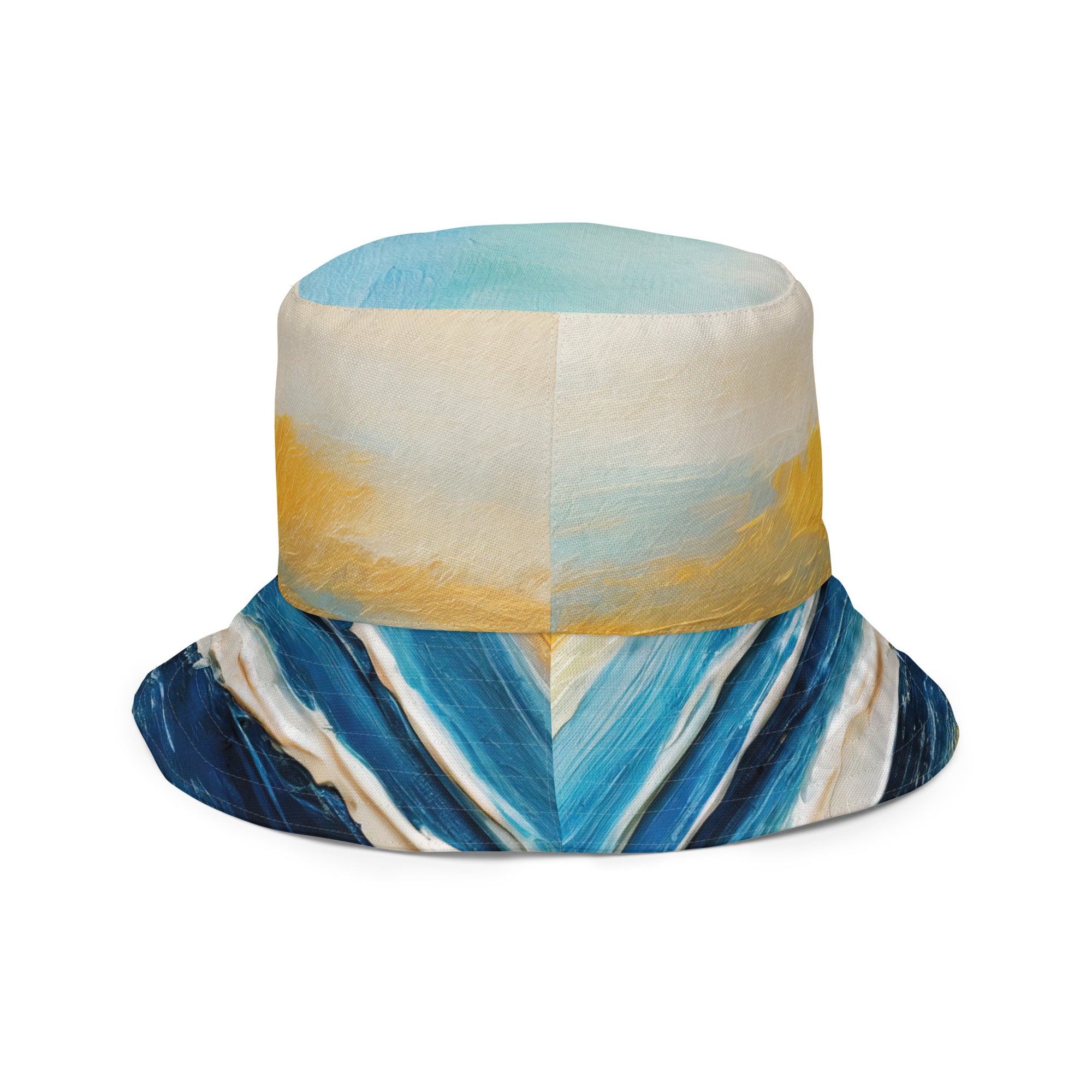 Reversible bucket hat featuring Blue Ocean and Golden Sunset print, showcasing vibrant colors and stylish design.