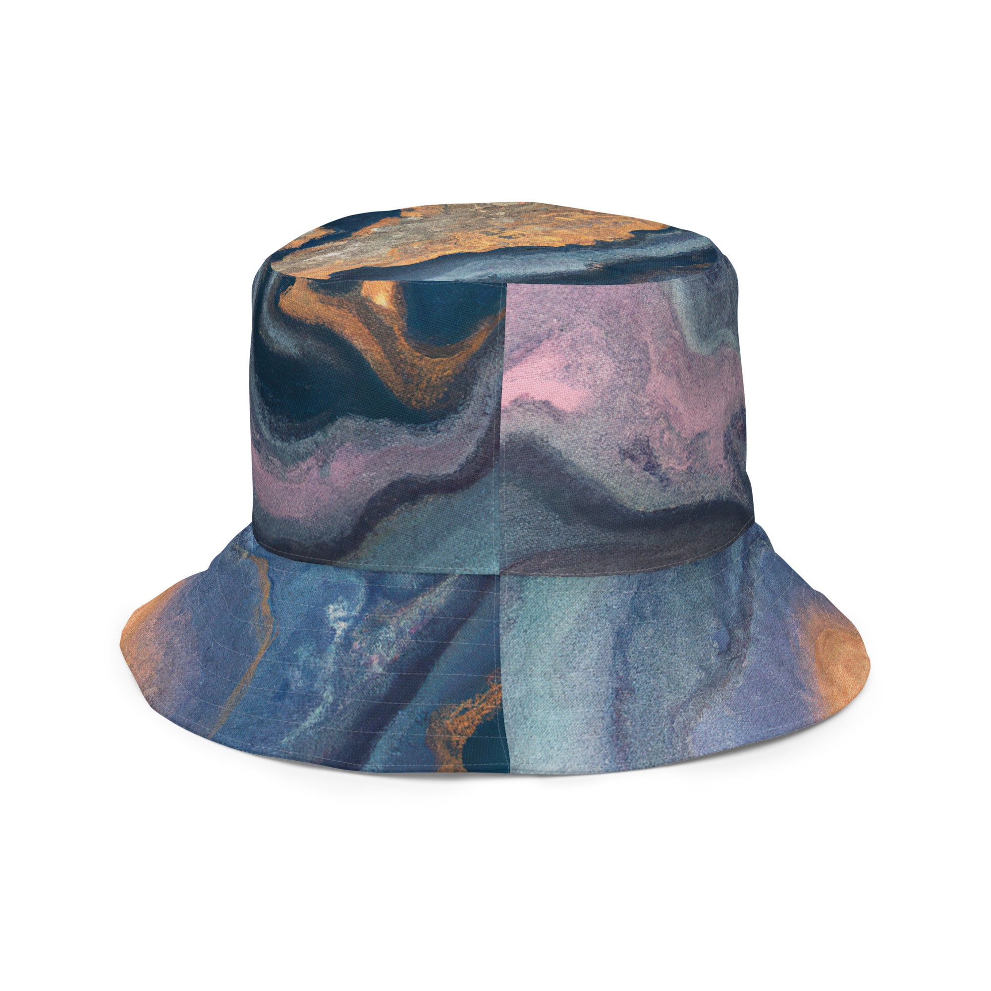 Reversible bucket hat featuring a blue pink marble swirl print, showcasing its vibrant colors and stylish design.