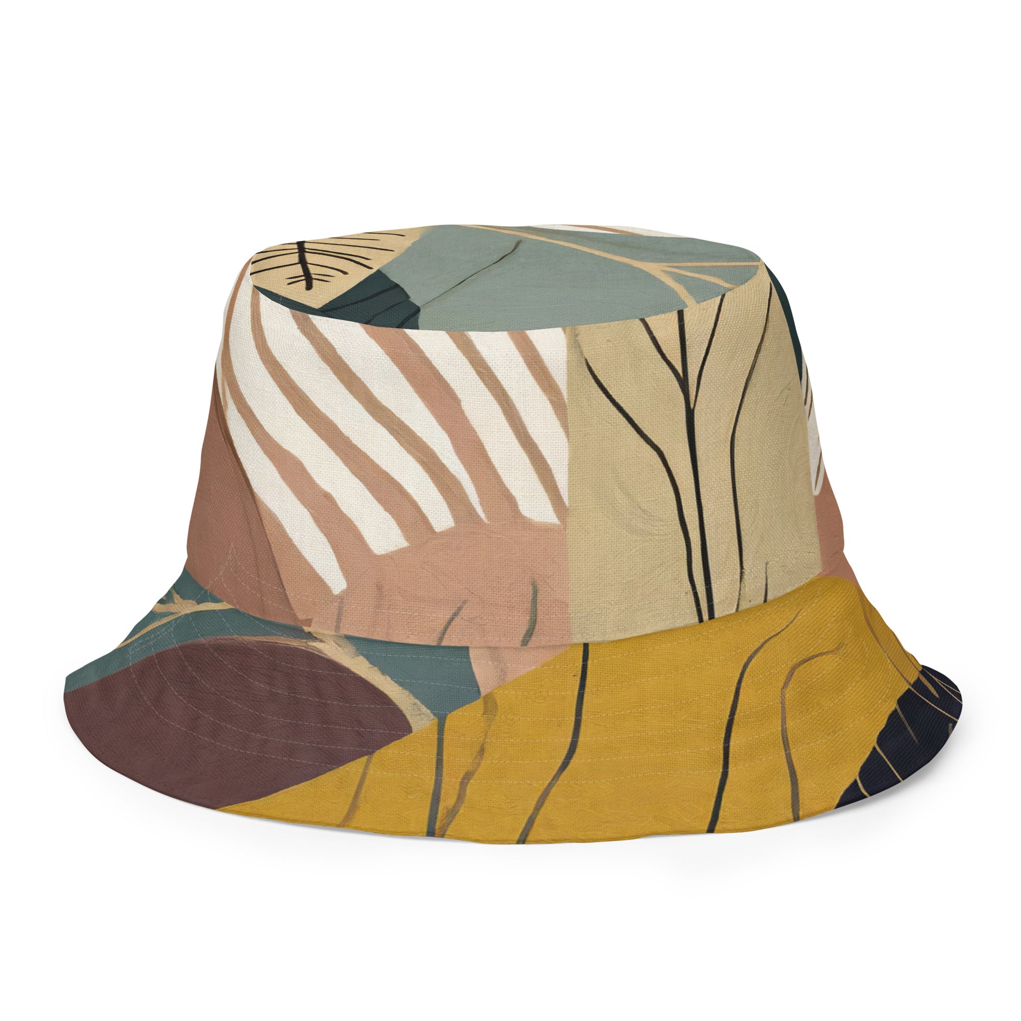 Reversible bucket hat featuring a boho style print, showcasing its dual-sided design and wide brim for sun protection.