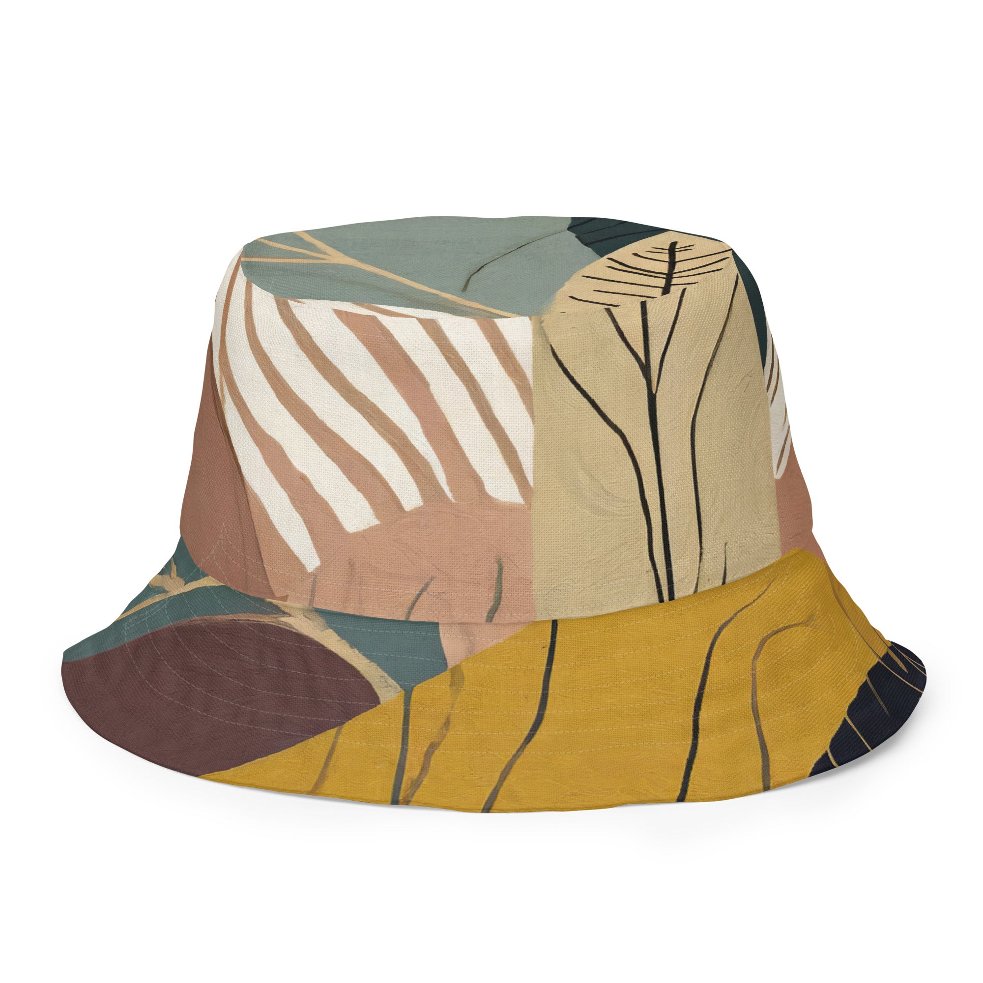 Reversible bucket hat featuring a boho style print, showcasing its dual-sided design and wide brim for sun protection.