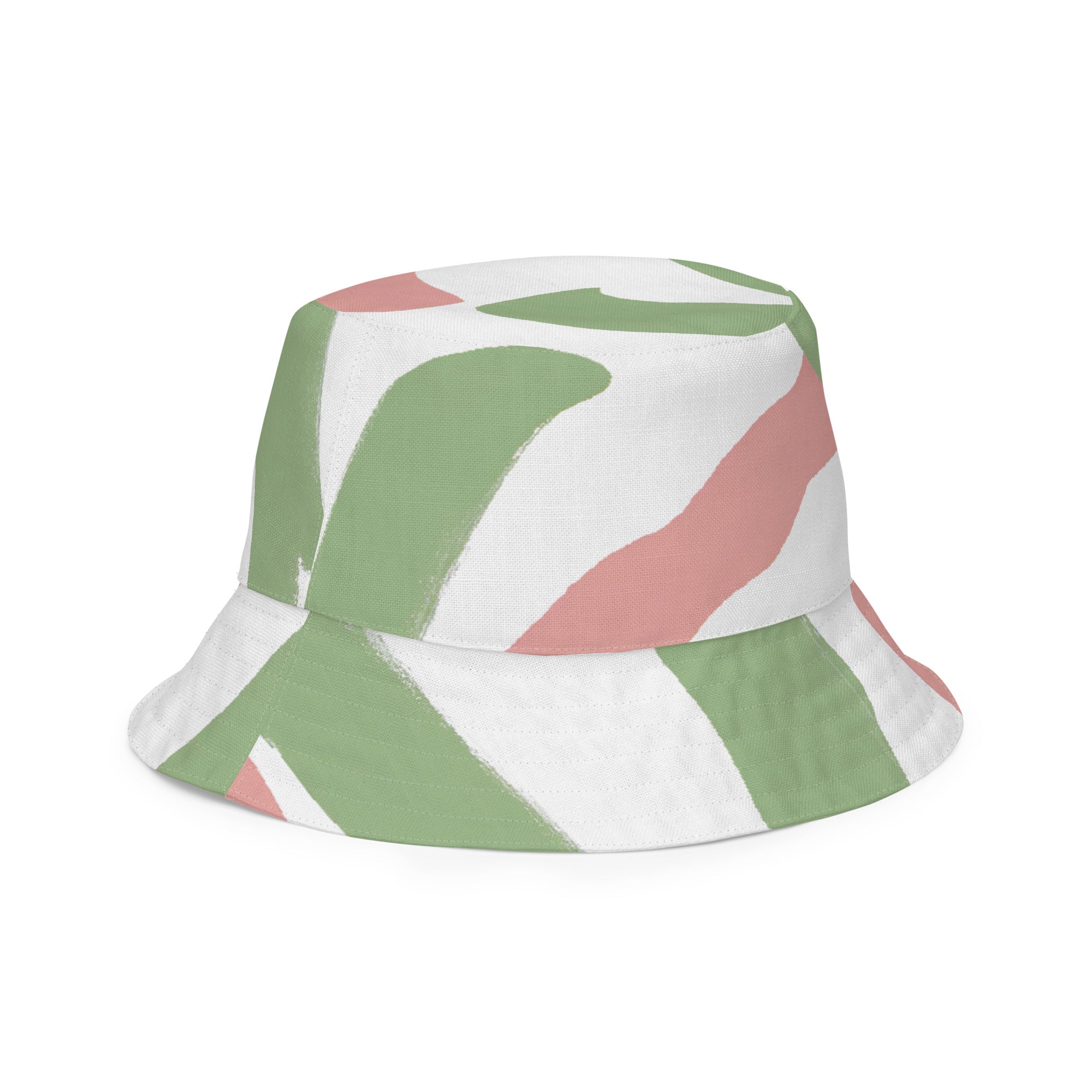 Reversible bucket hat featuring a green mauve abstract brush stroke pattern, showcasing its stylish design and breathable fabric.