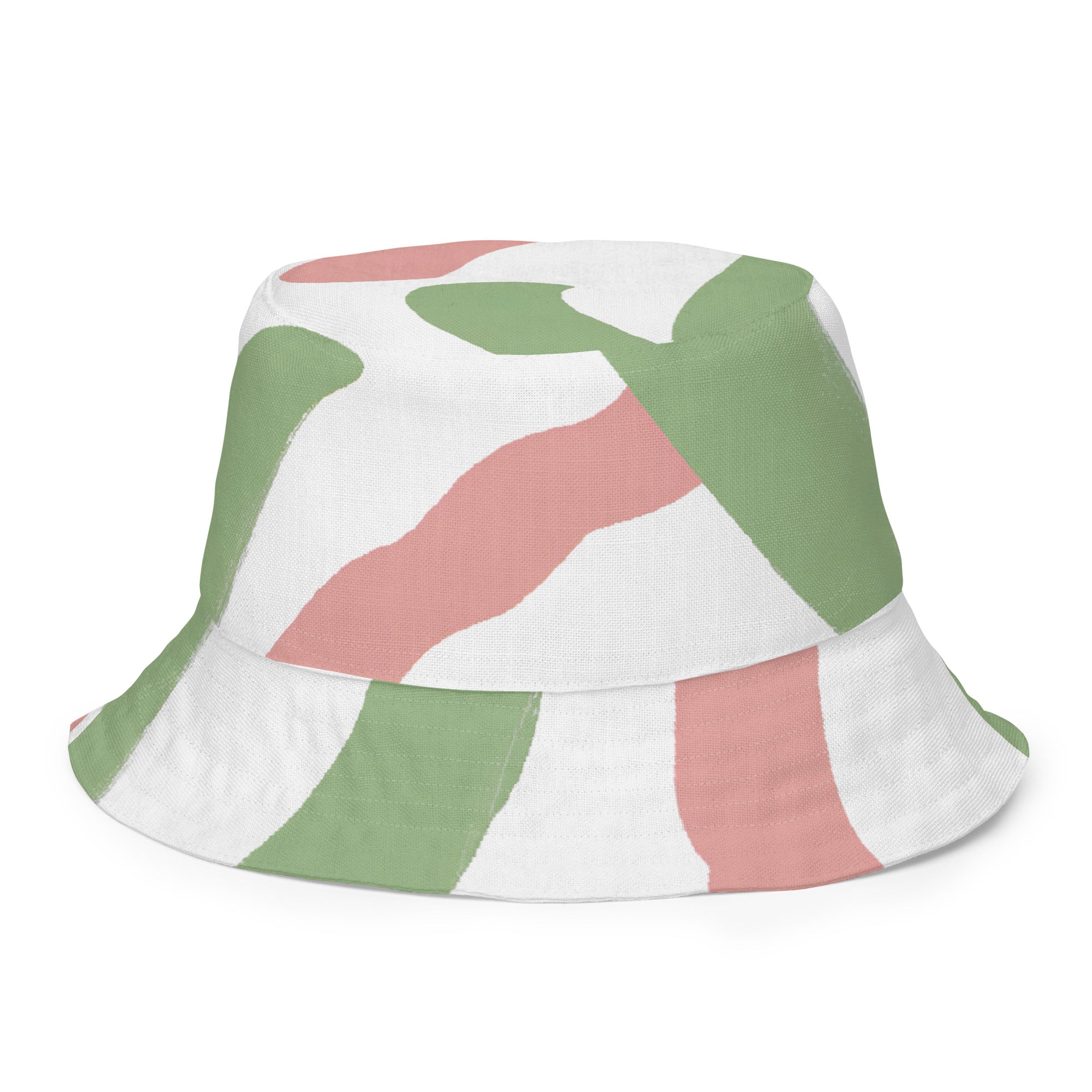 Reversible bucket hat featuring a green mauve abstract brush stroke pattern, showcasing its stylish design and breathable fabric.