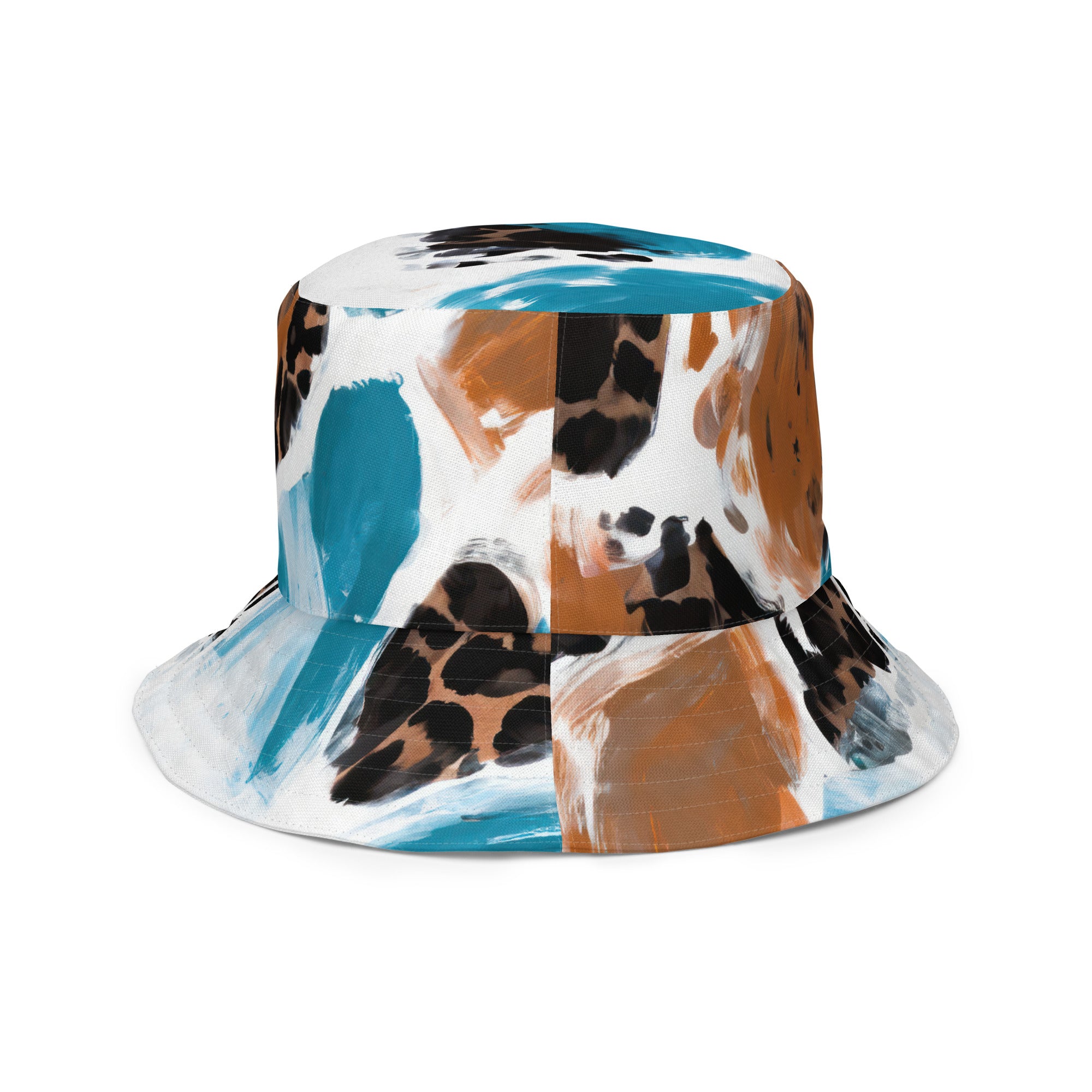 Reversible bucket hat featuring a light blue and brown spotted pattern, showcasing both sides of the design.