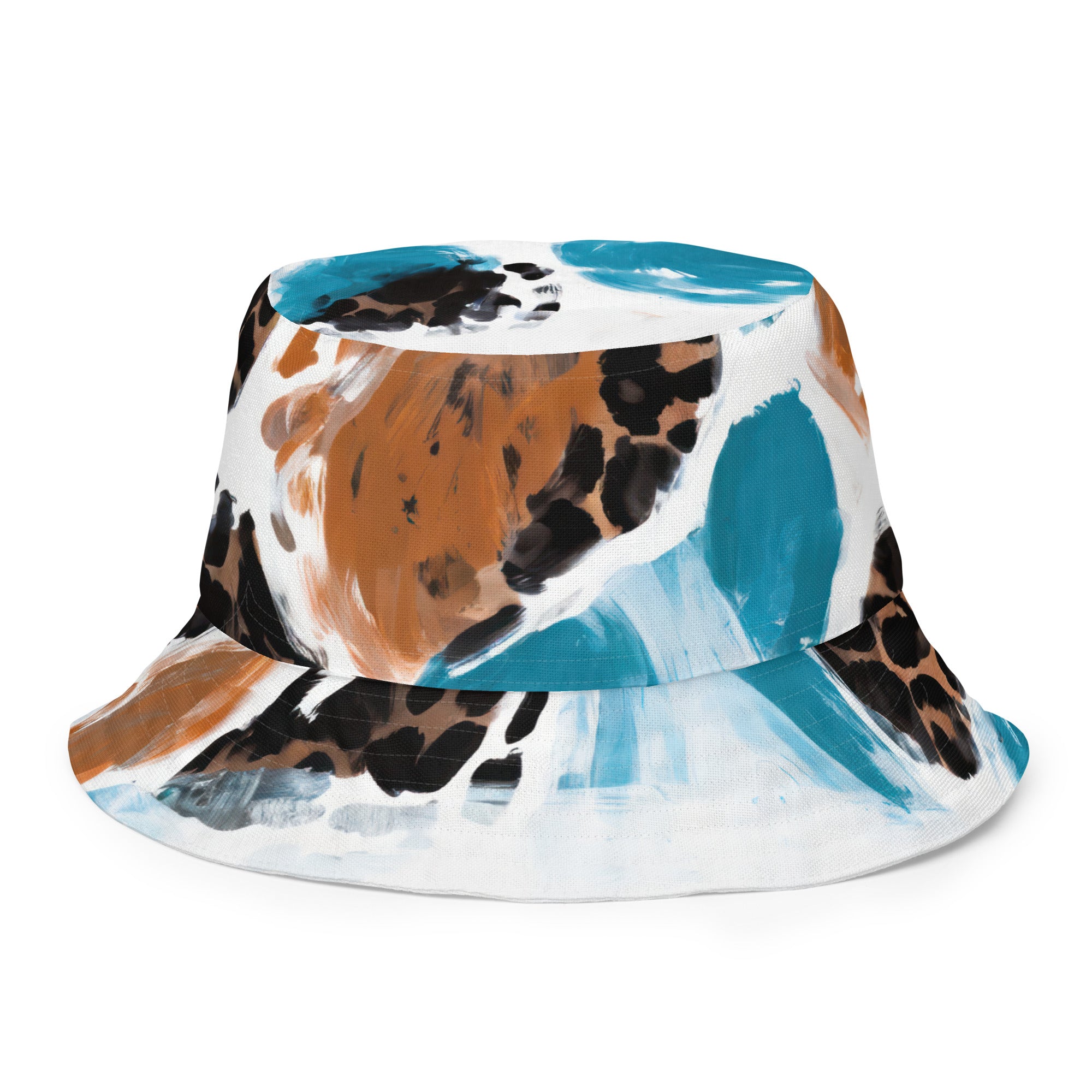 Reversible bucket hat featuring a light blue and brown spotted pattern, showcasing both sides of the design.