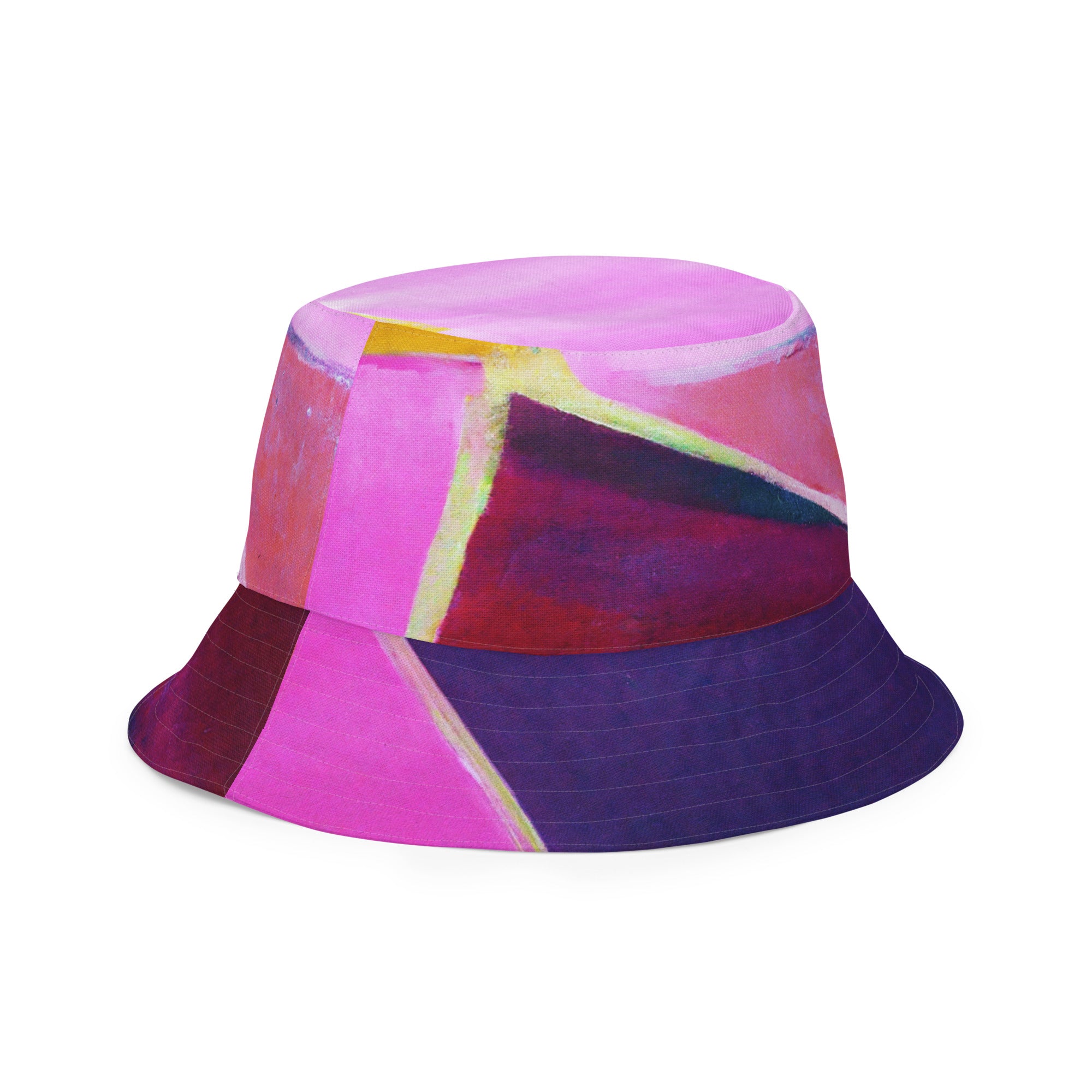 Reversible bucket hat featuring a pink and purple geometric pattern, showcasing both sides of the design.