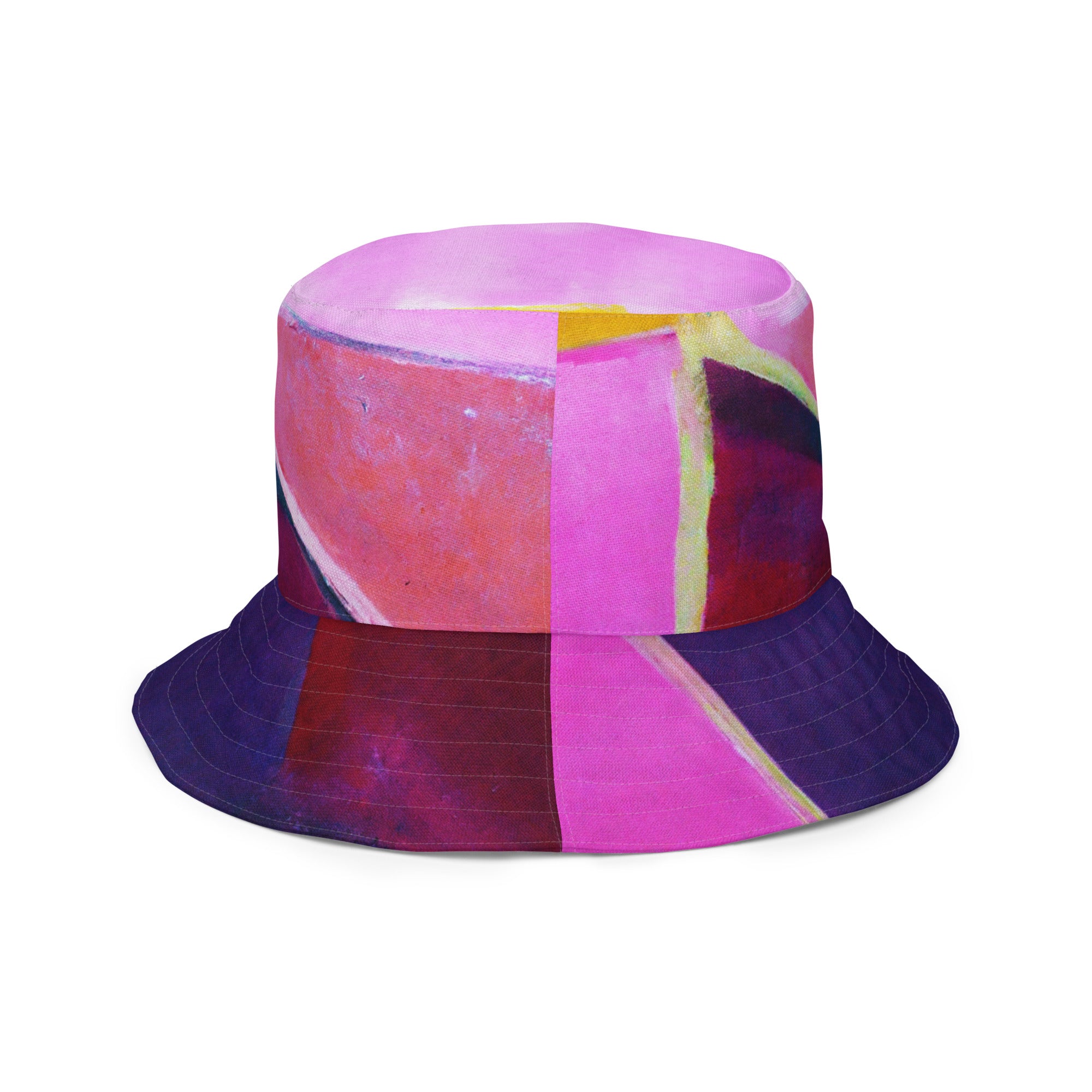 Reversible bucket hat featuring a pink and purple geometric pattern, showcasing both sides of the design.