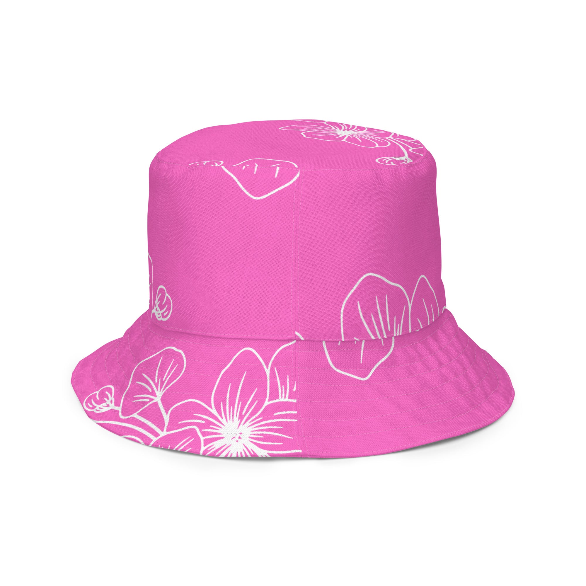 Reversible bucket hat featuring a pink floral design, showcasing both sides of the fabric.