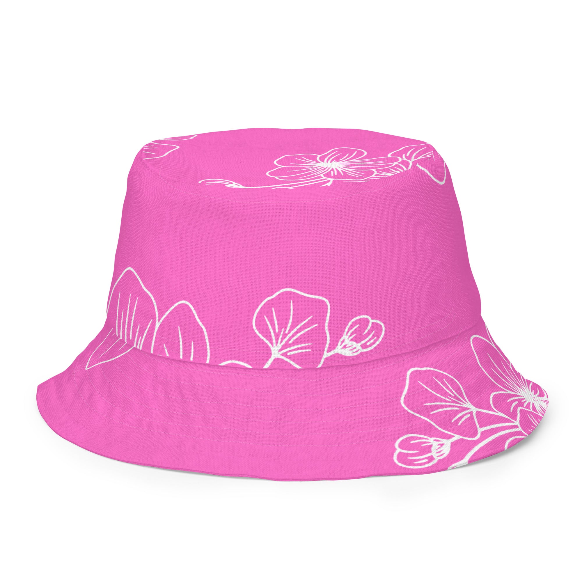 Reversible bucket hat featuring a pink floral design, showcasing both sides of the fabric.