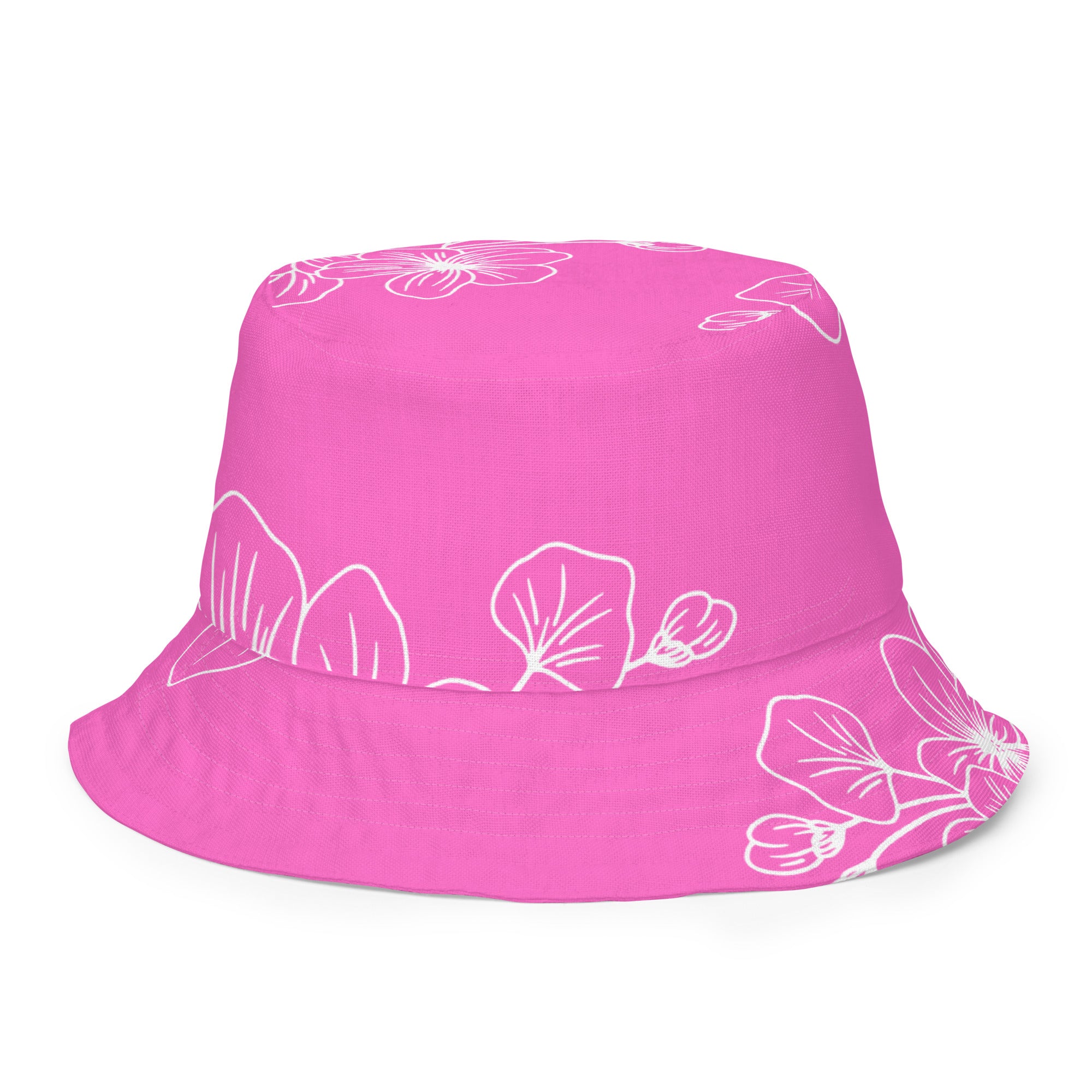 Reversible bucket hat featuring a pink floral design, showcasing both sides of the fabric.