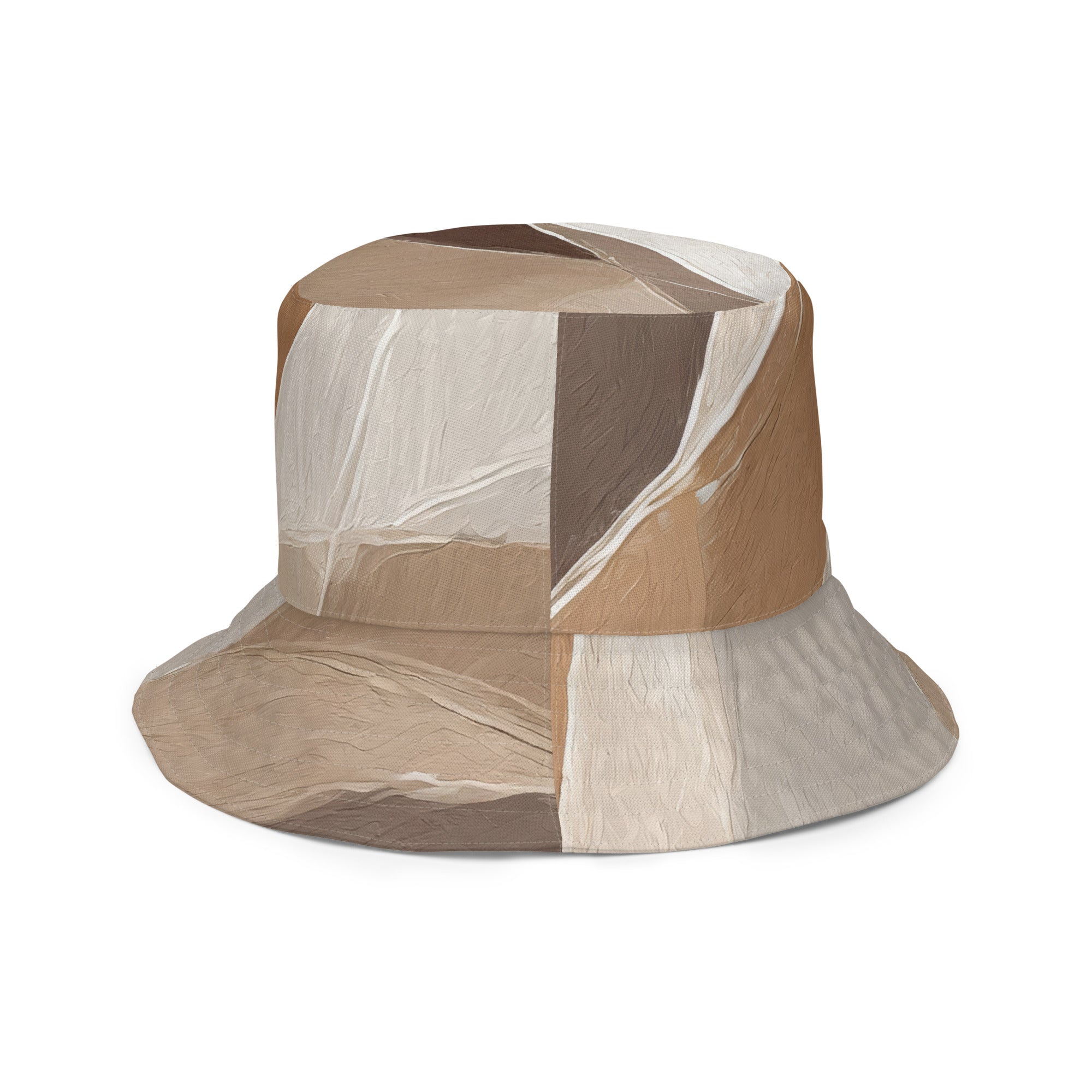 Reversible bucket hat featuring rustic brown stone print and taupe brown textured pattern, perfect for outdoor activities and fashion.