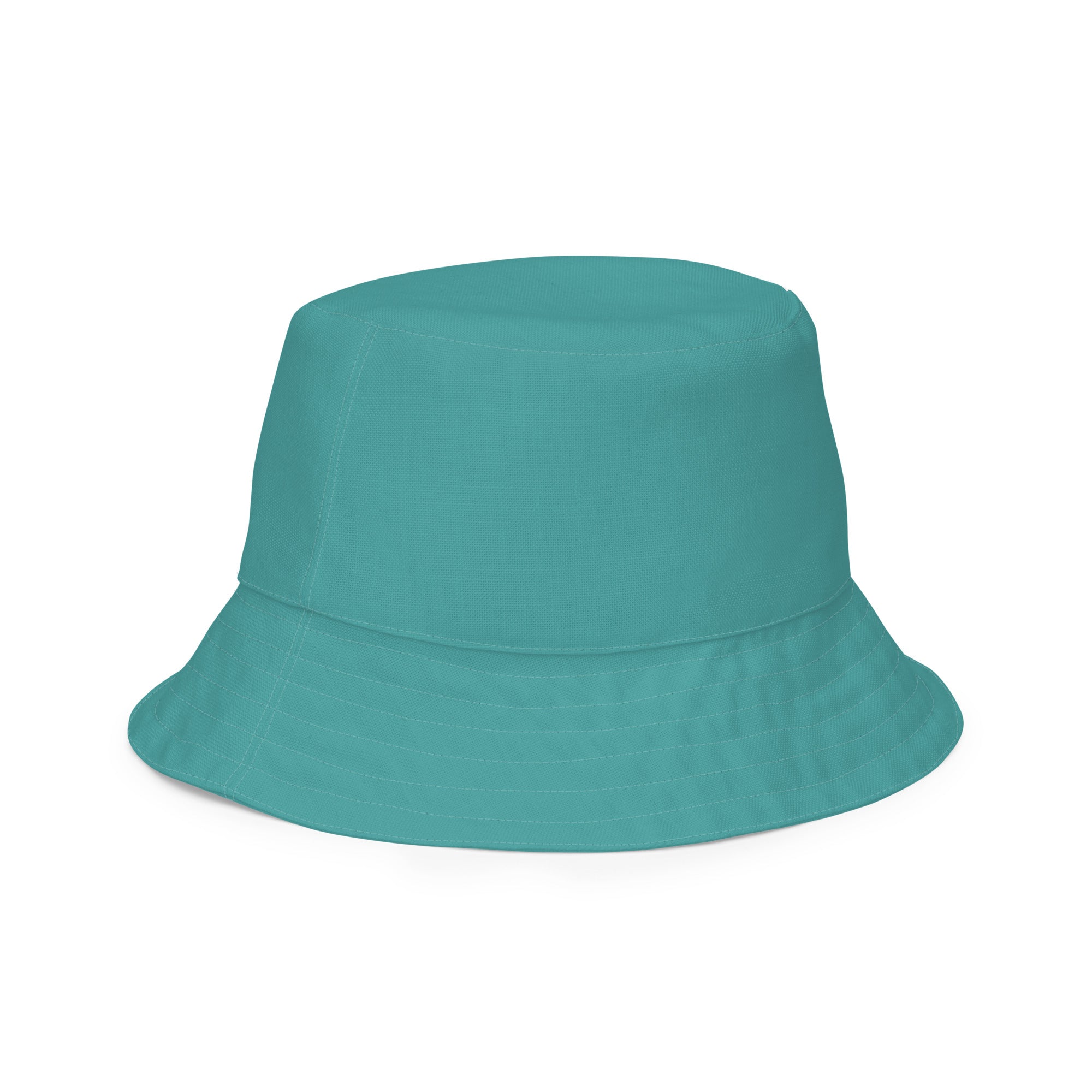 Reversible Bucket Hat in Teal Green showcasing its dual-sided design and wide brim for sun protection.