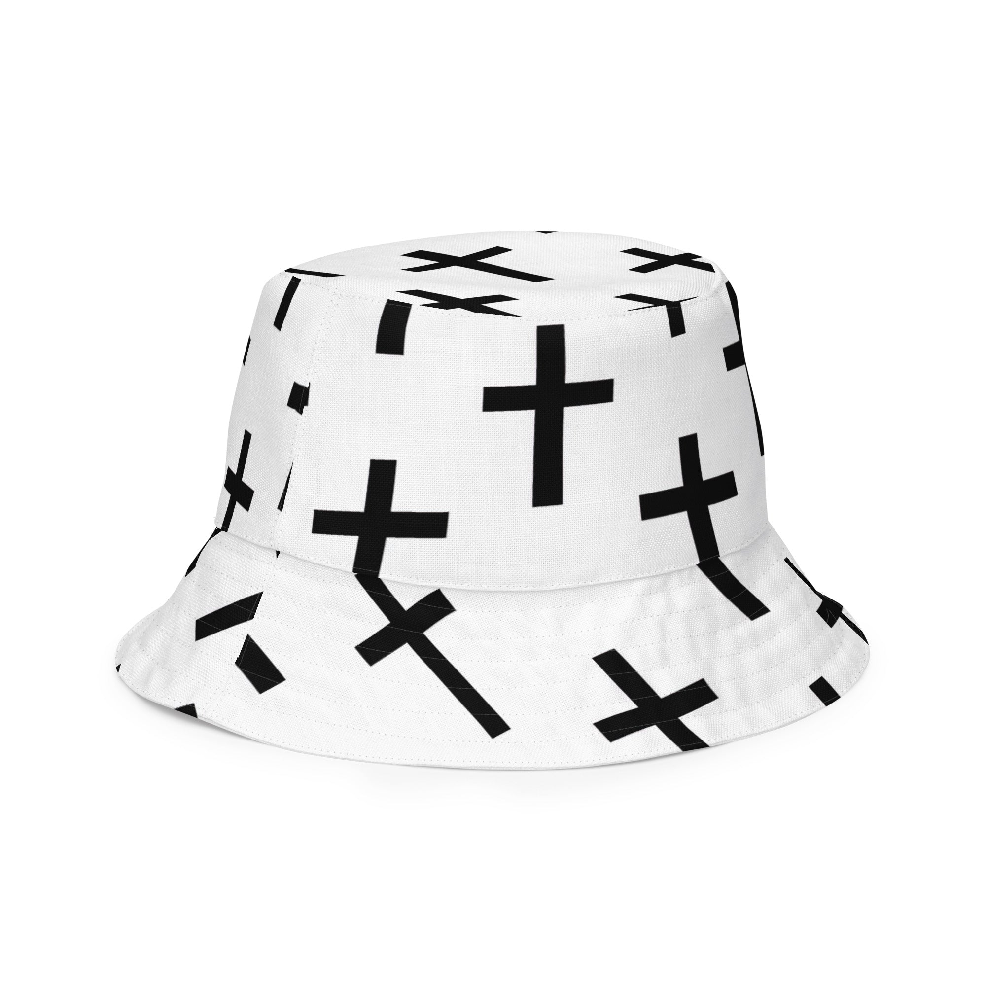 Reversible bucket hat featuring a white and black cross print, showcasing its stylish design and premium fabric.